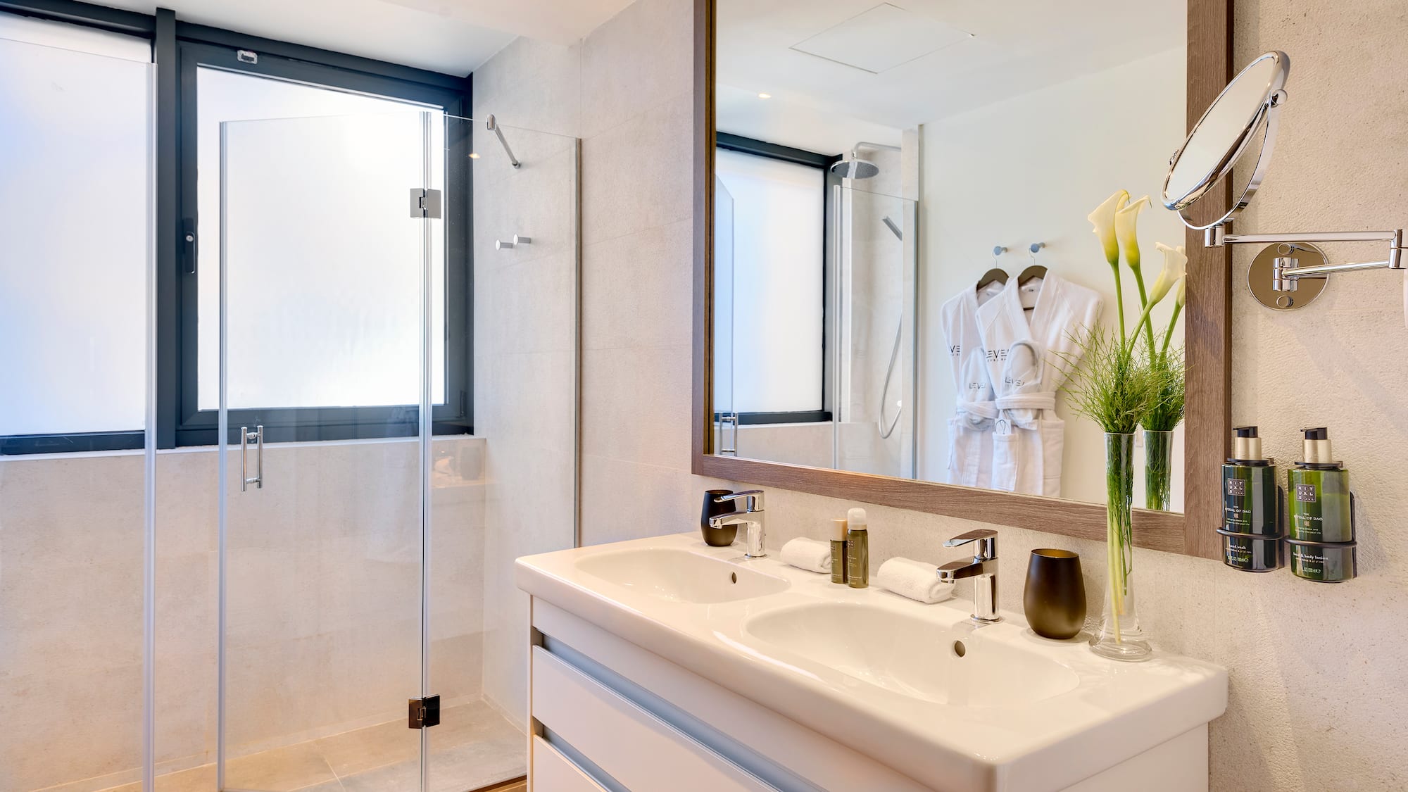 a bathroom with a mirror and sink