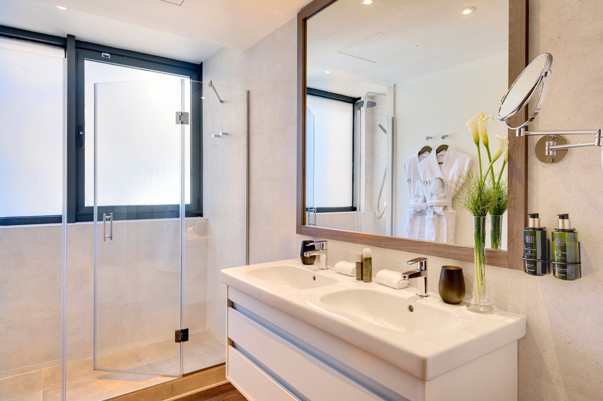 a bathroom with a mirror and sink