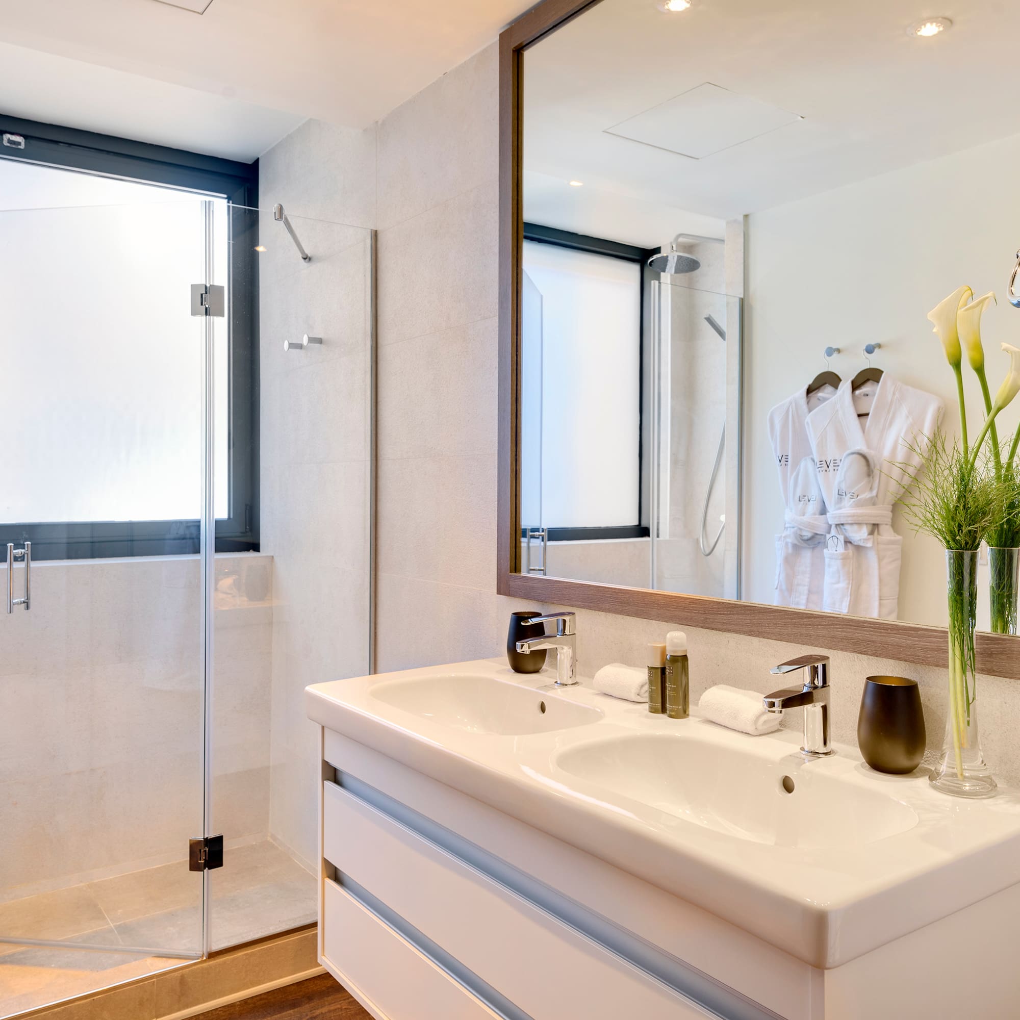 a bathroom with a mirror and sink
