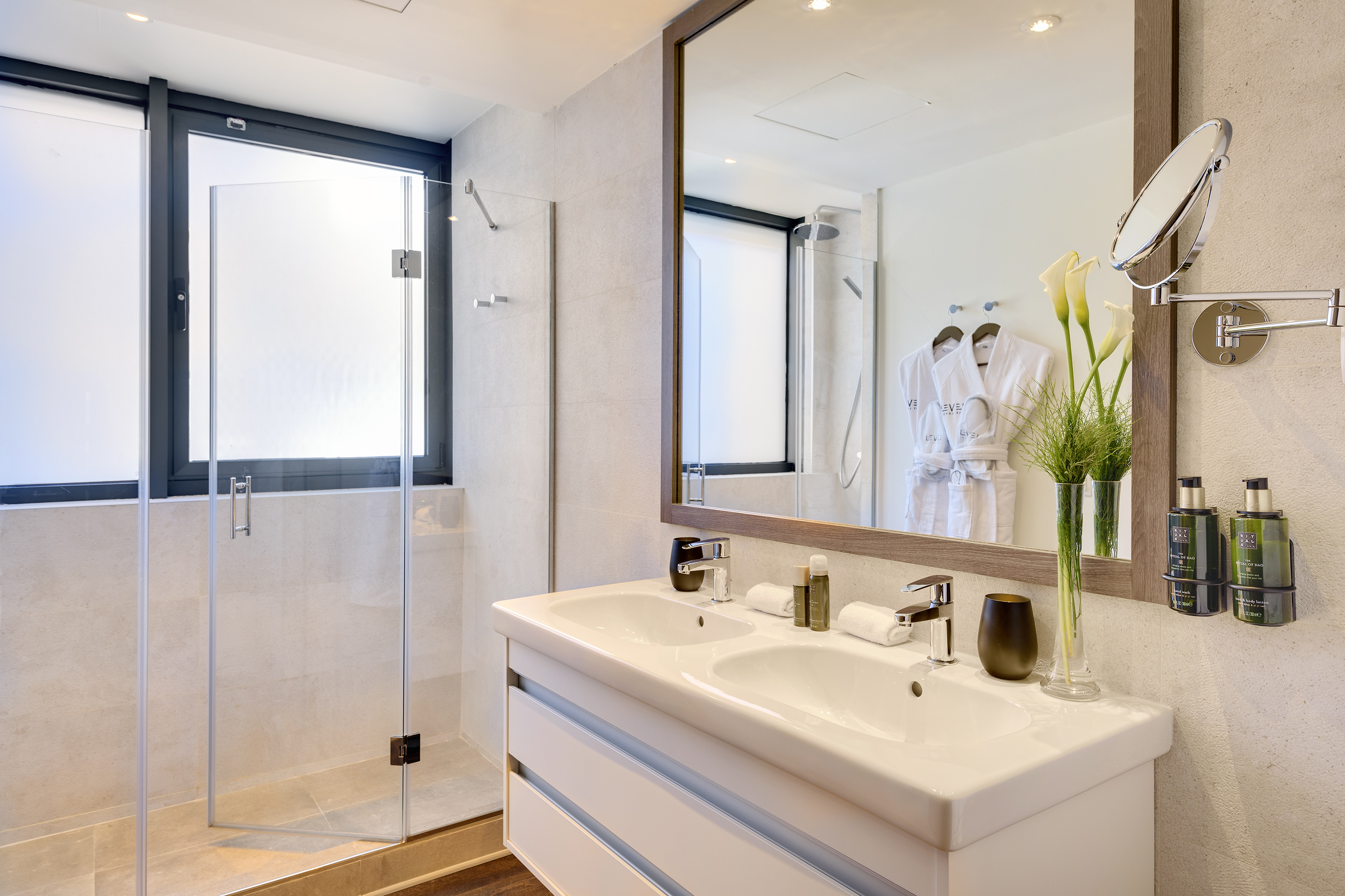 a bathroom with a mirror and sink