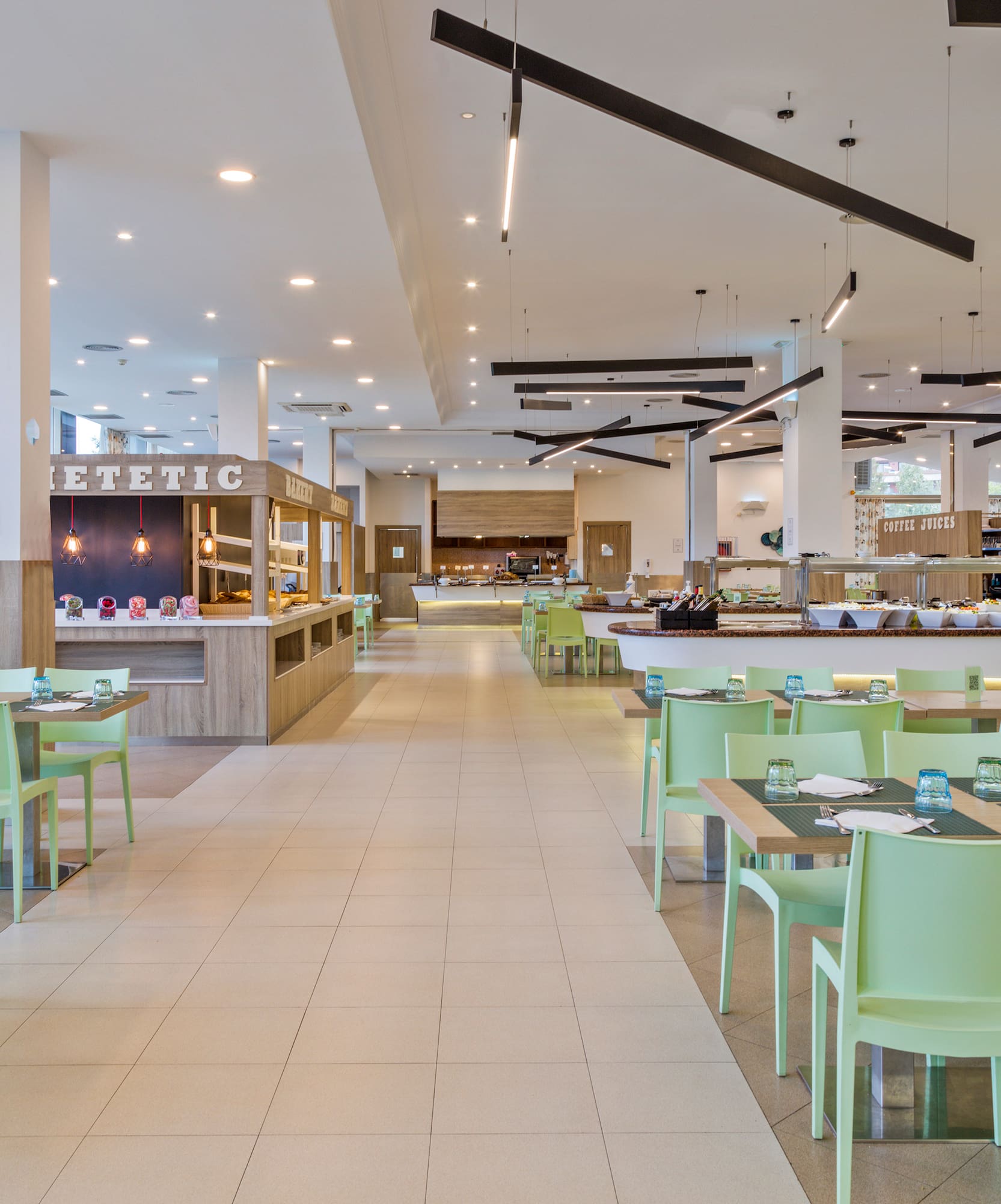 a restaurant with tables and chairs