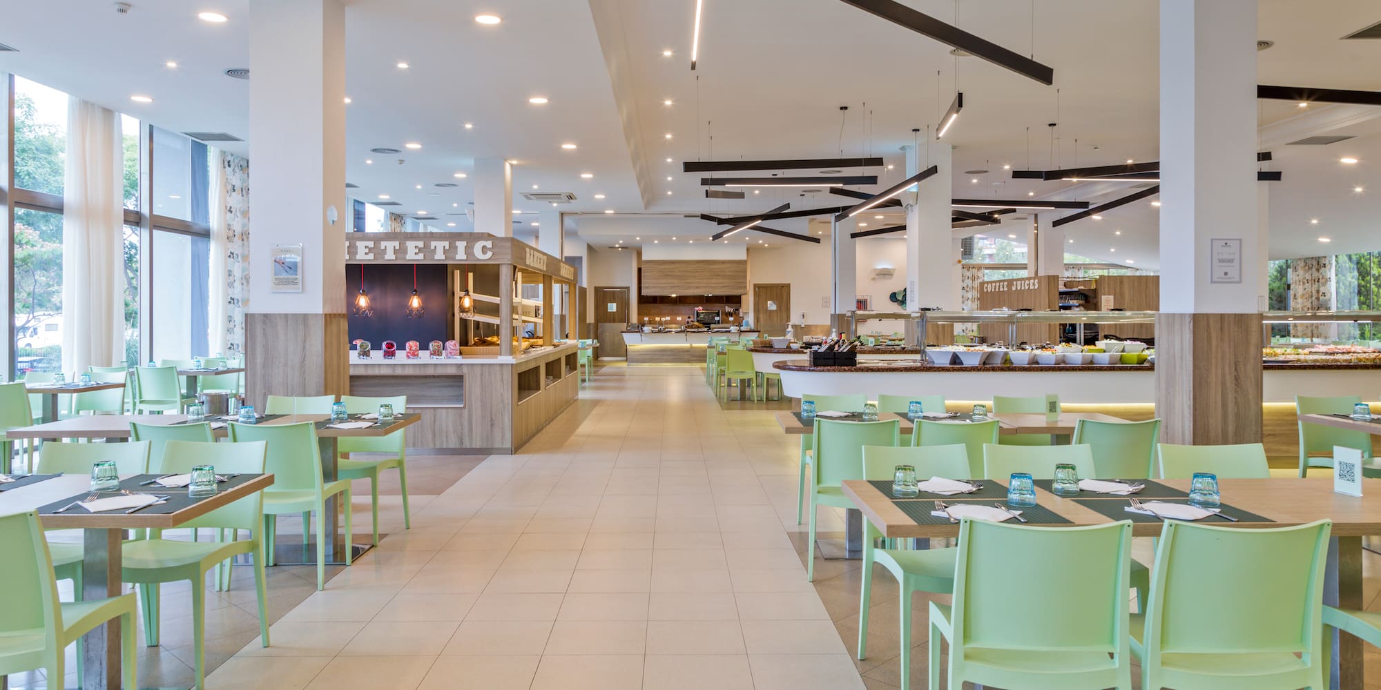 a restaurant with tables and chairs