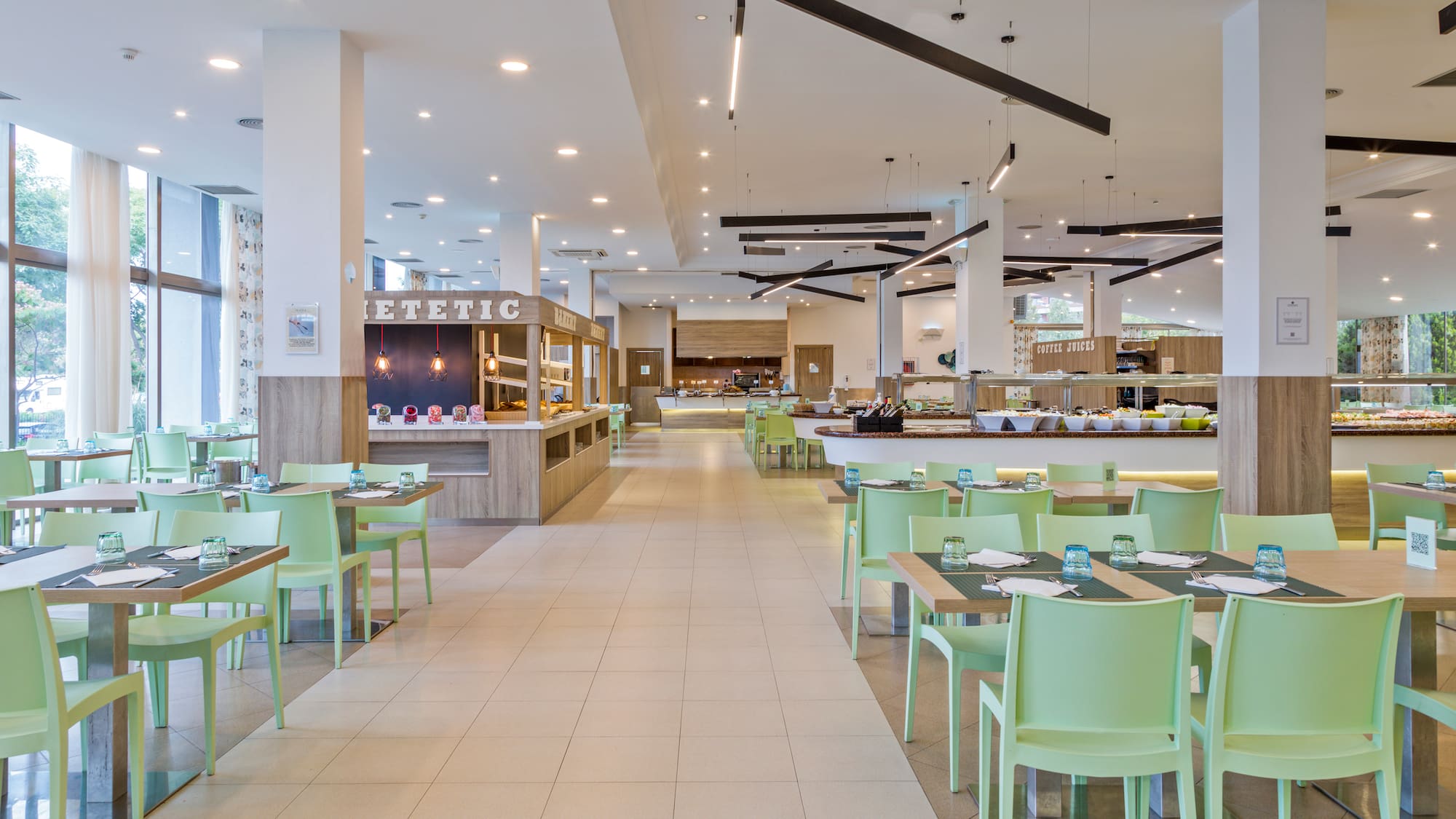 a restaurant with tables and chairs