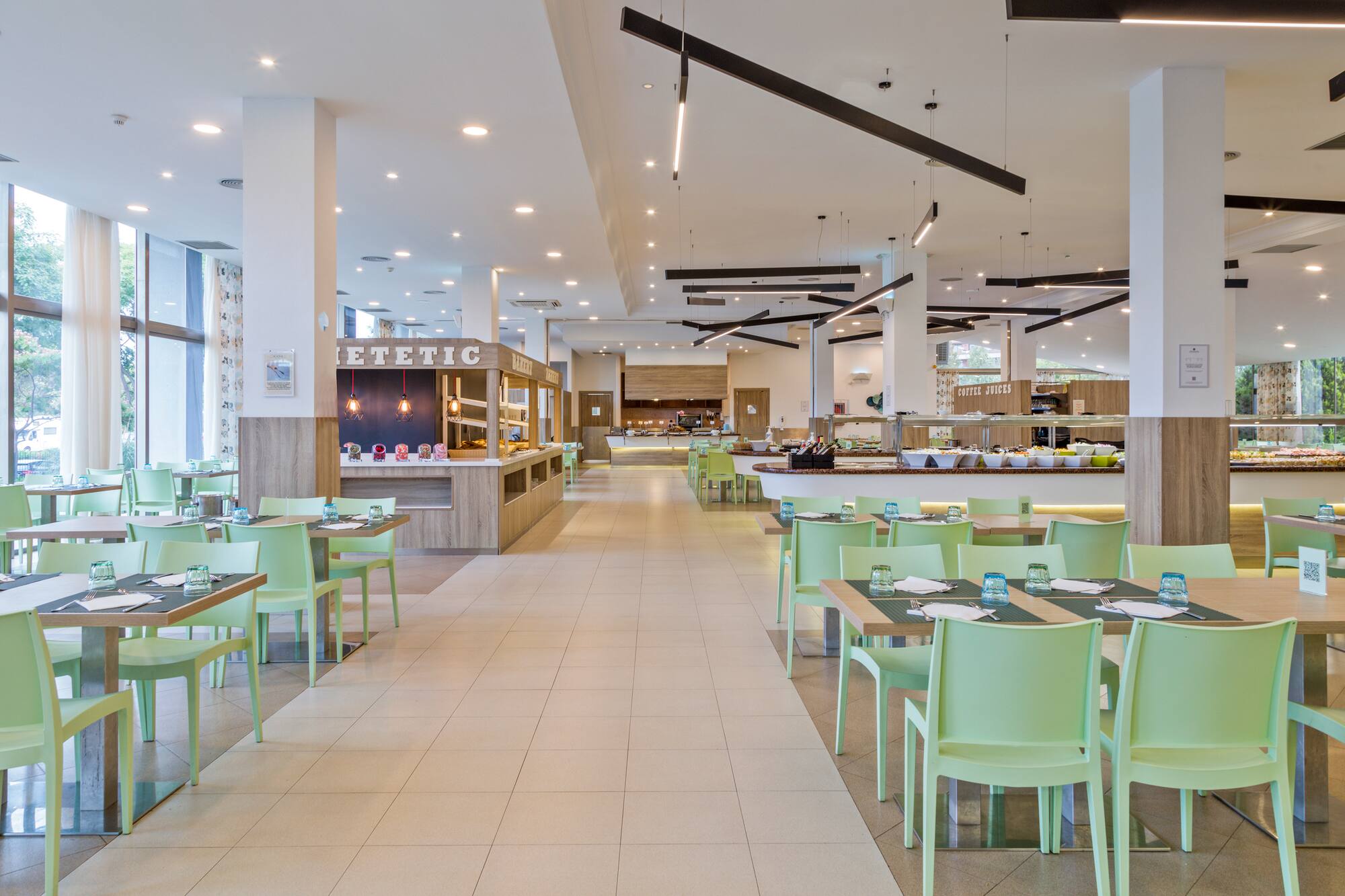 a restaurant with tables and chairs