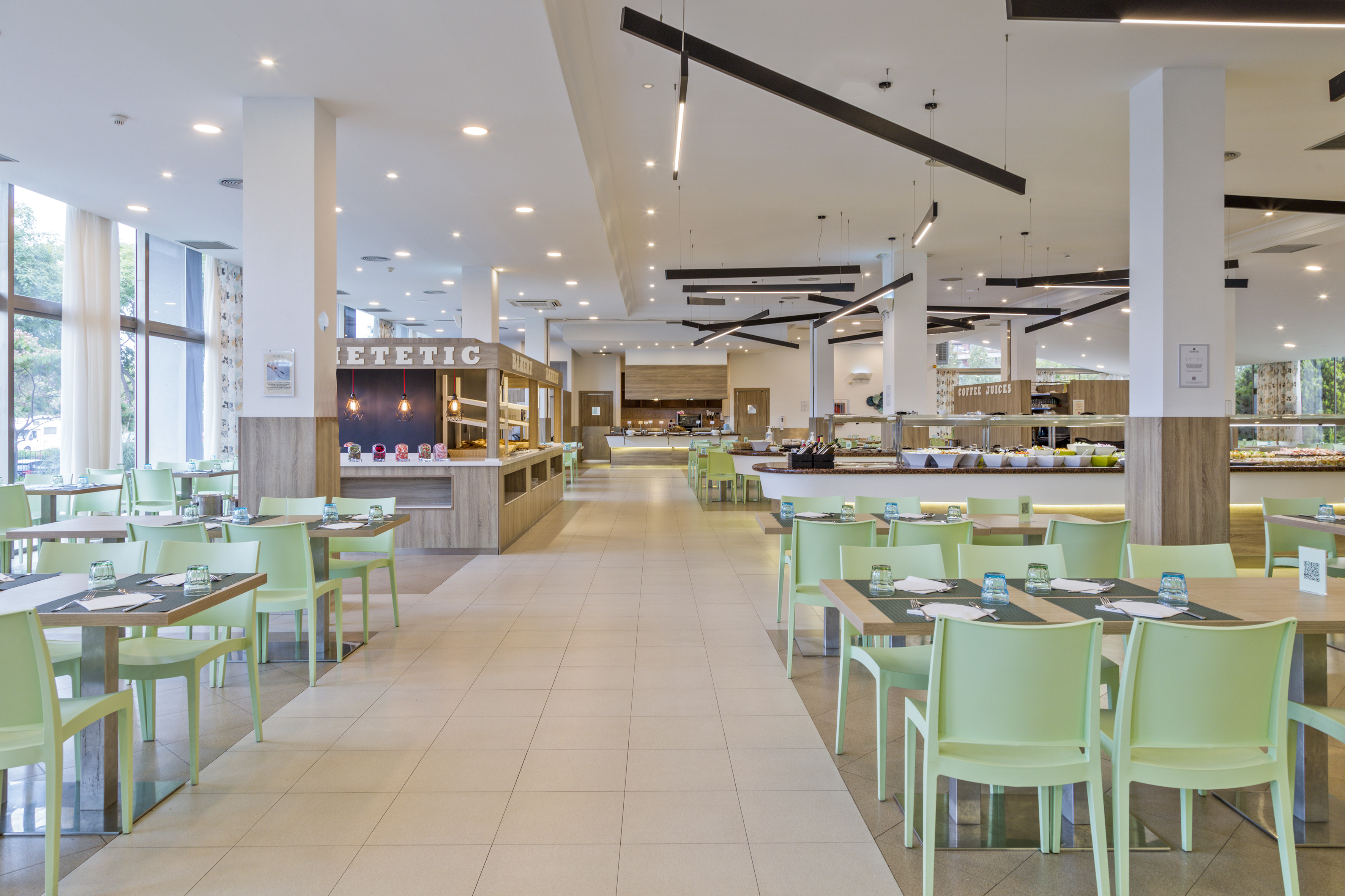 a restaurant with tables and chairs