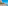 Sunny beach promenade, people, turquoise sea, and cliffside resort hotels.
