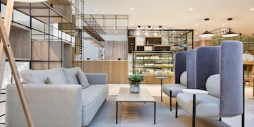 a room with a couch and a coffee table