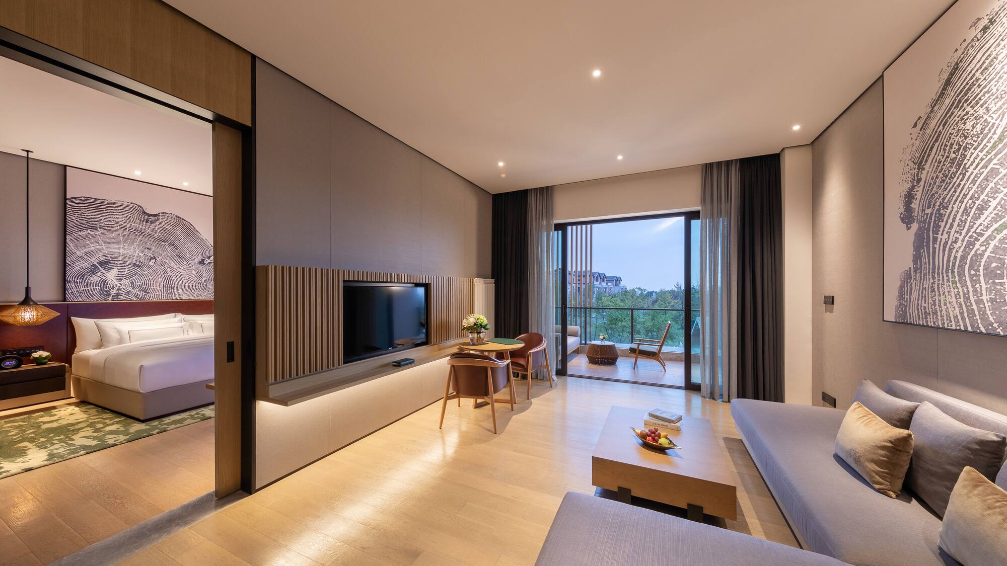 a living room with a television and a couch