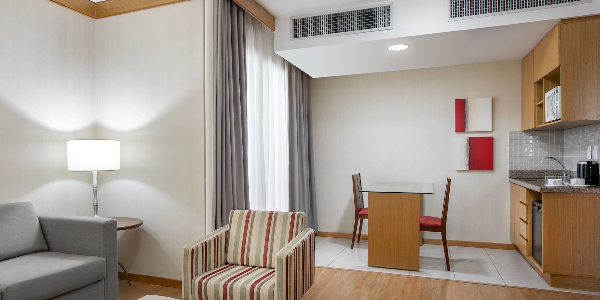 a room with a table and chairs