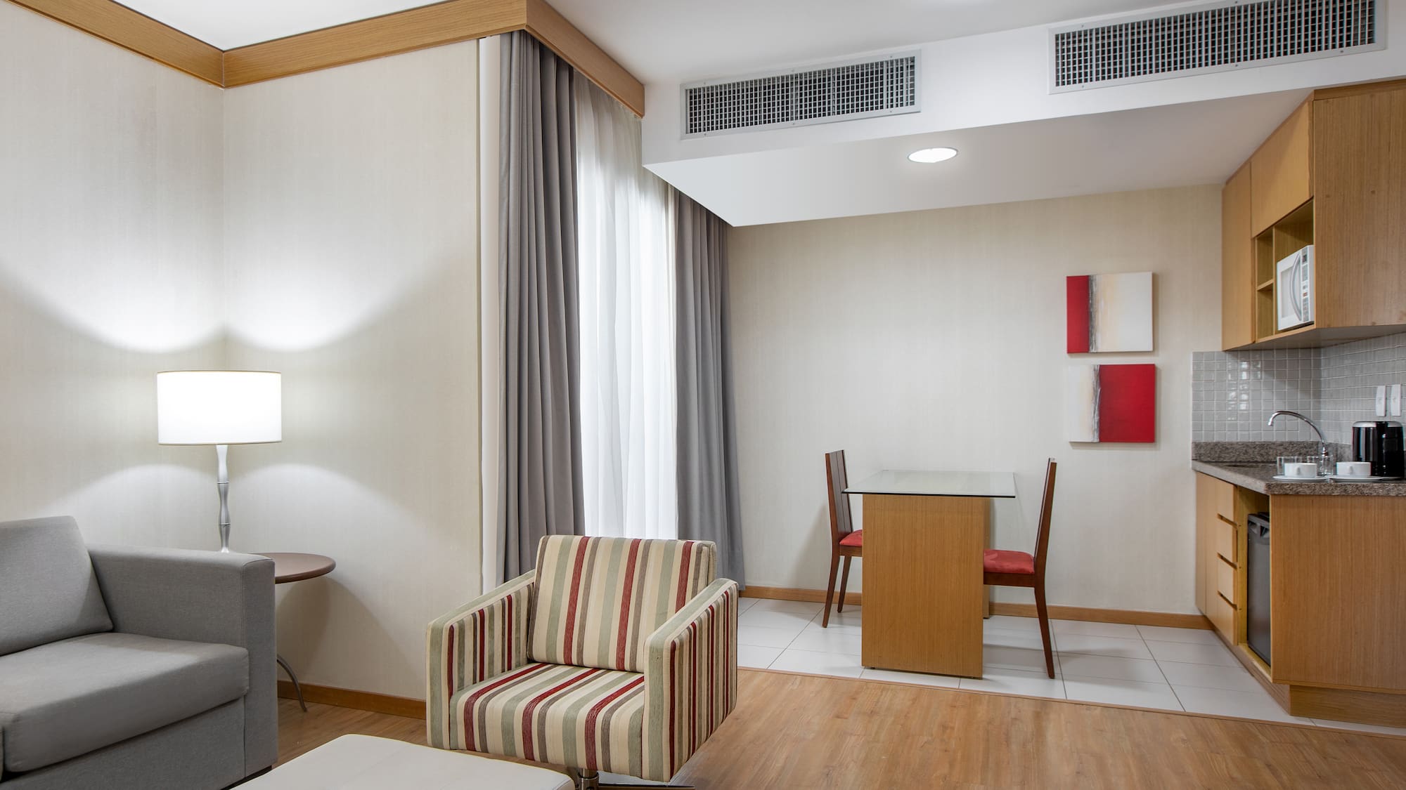 a room with a table and chairs