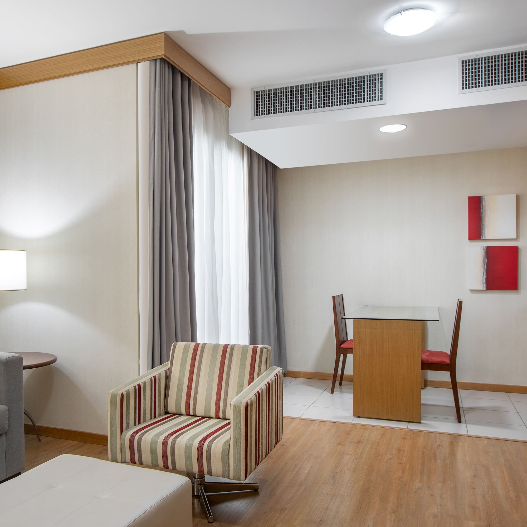 a room with a table and chairs