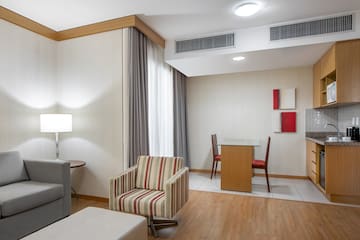 a room with a table and chairs