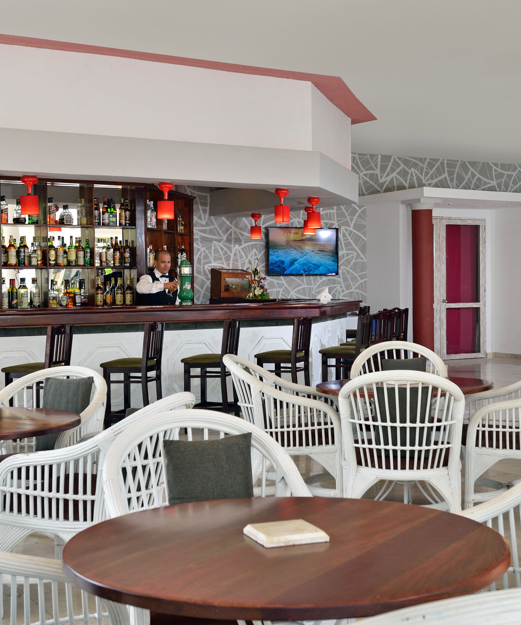 a bar with tables and chairs