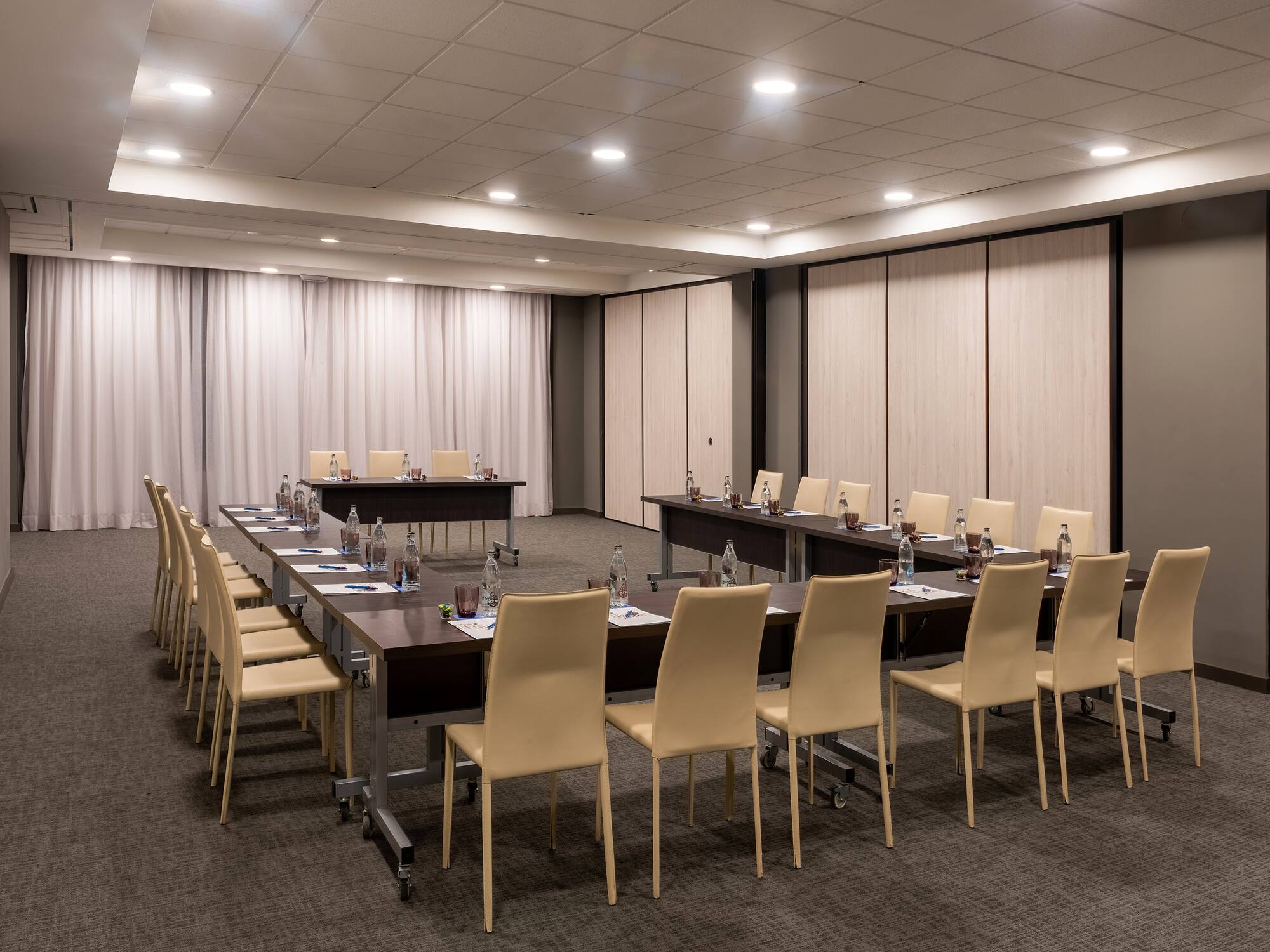 a room with tables and chairs