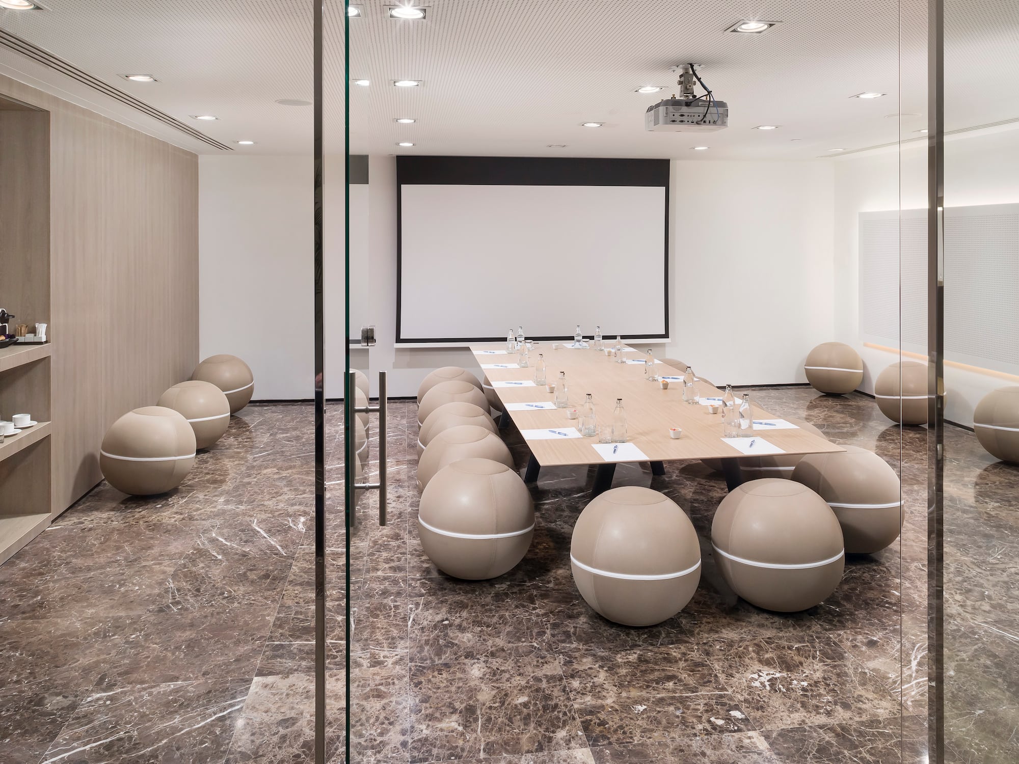 a room with a table and chairs