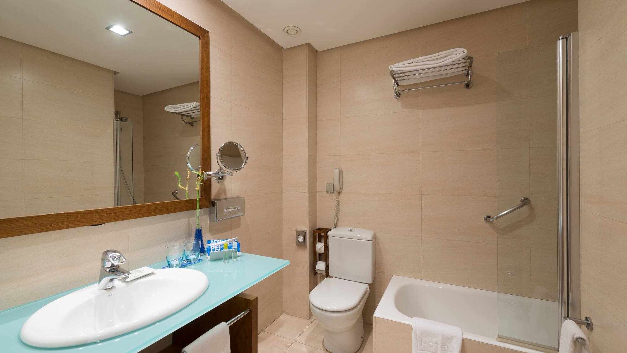 a bathroom with a sink toilet and bathtub