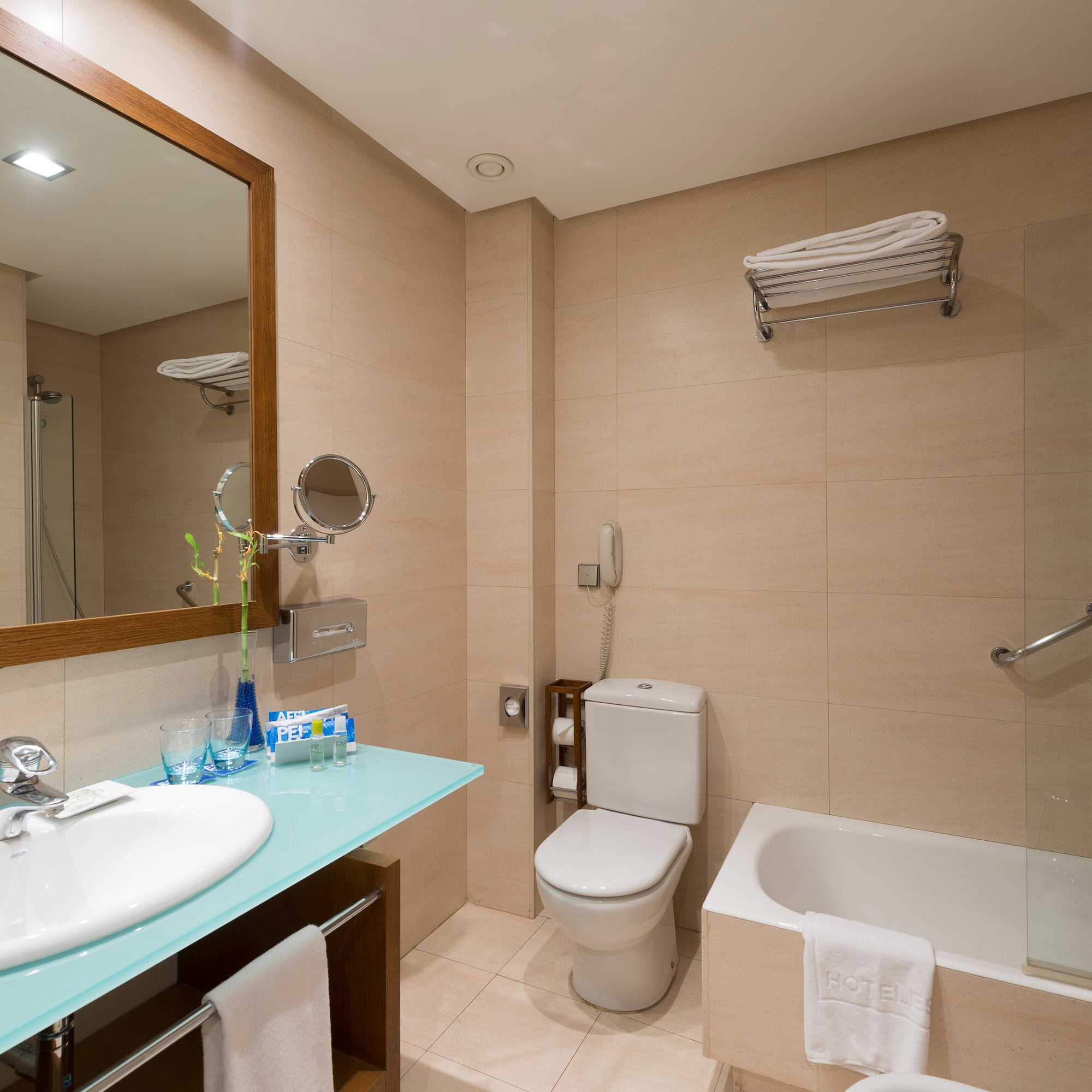 a bathroom with a sink toilet and bathtub