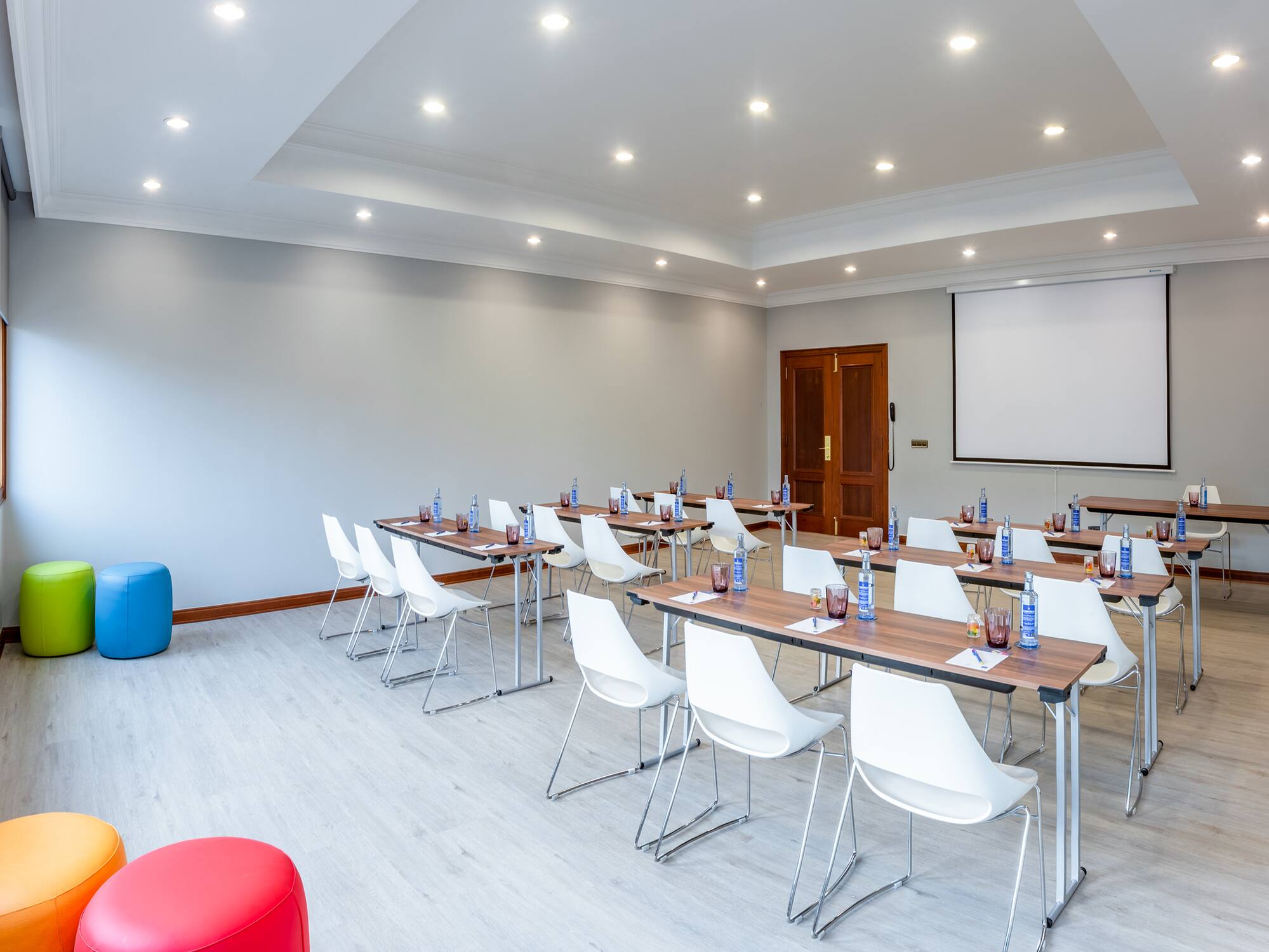 a room with tables and chairs