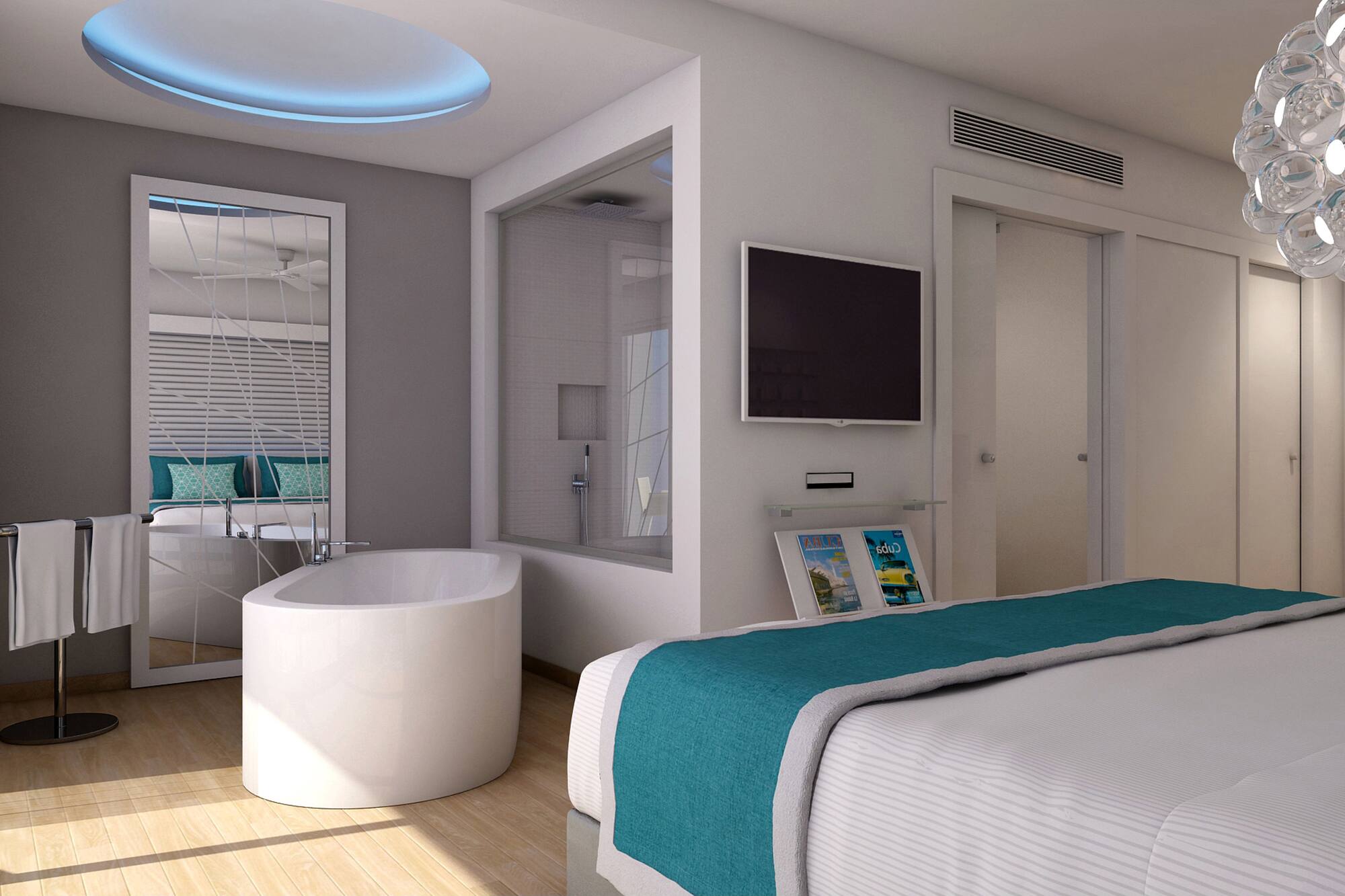 a bedroom with a tub and a tv