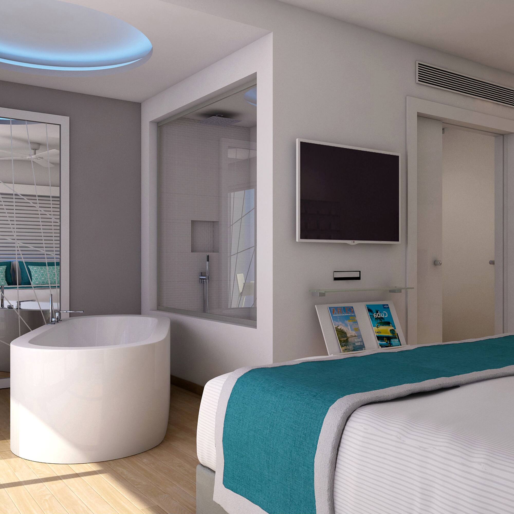 a bedroom with a tub and a tv