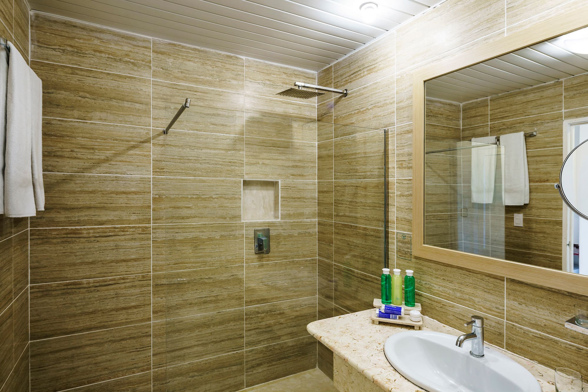 a bathroom with a sink and mirror