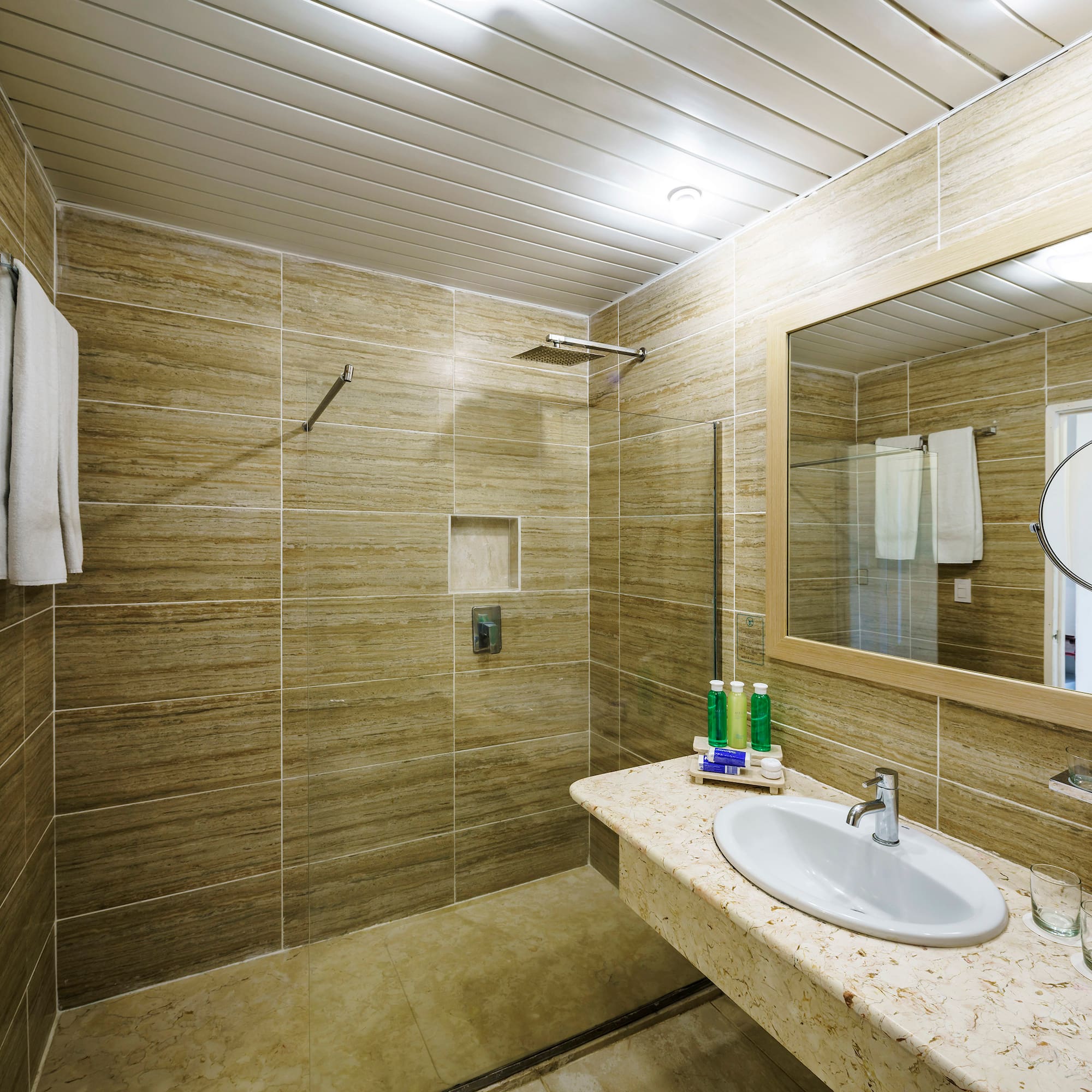 a bathroom with a sink and mirror
