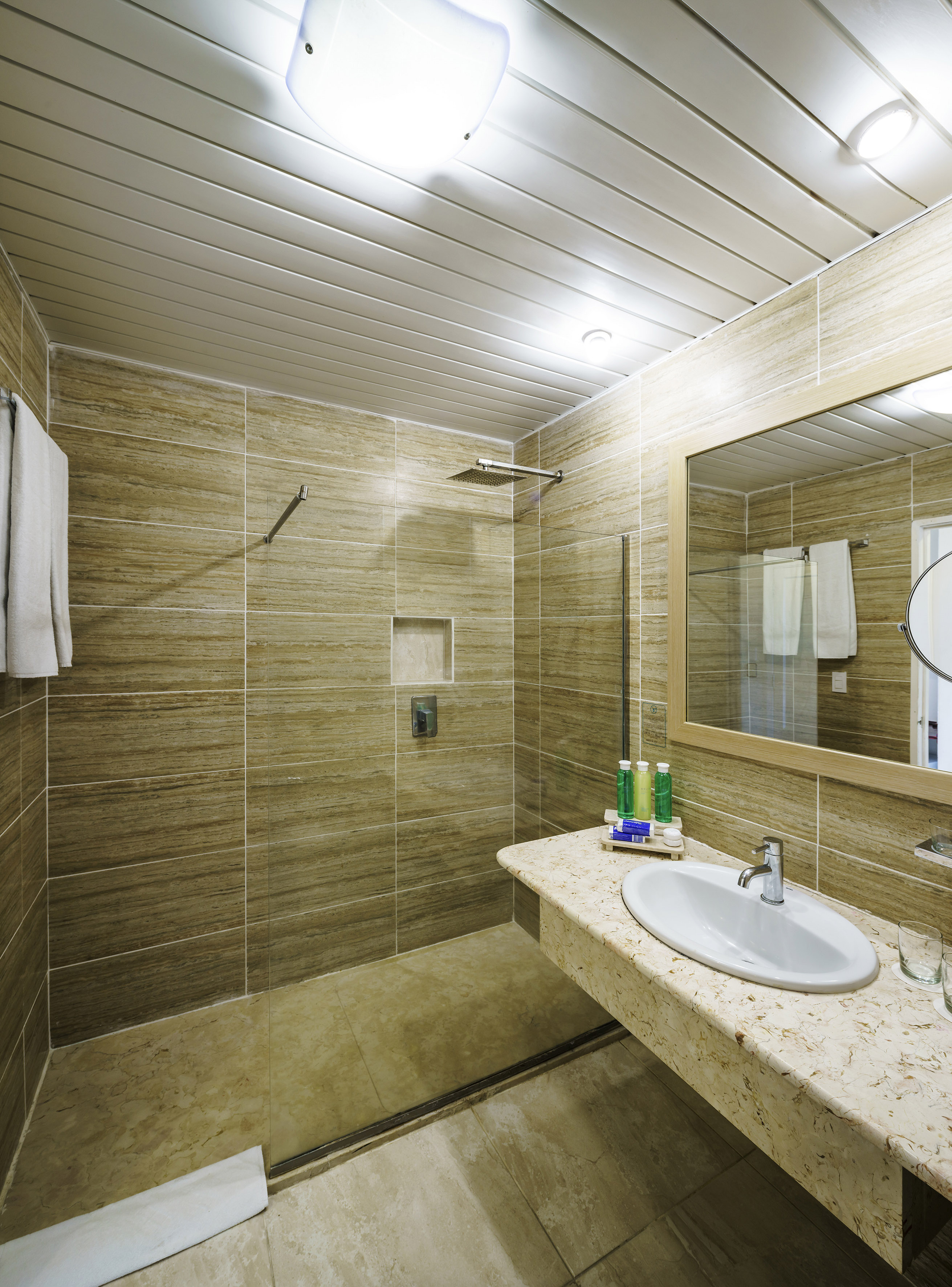 a bathroom with a sink and mirror