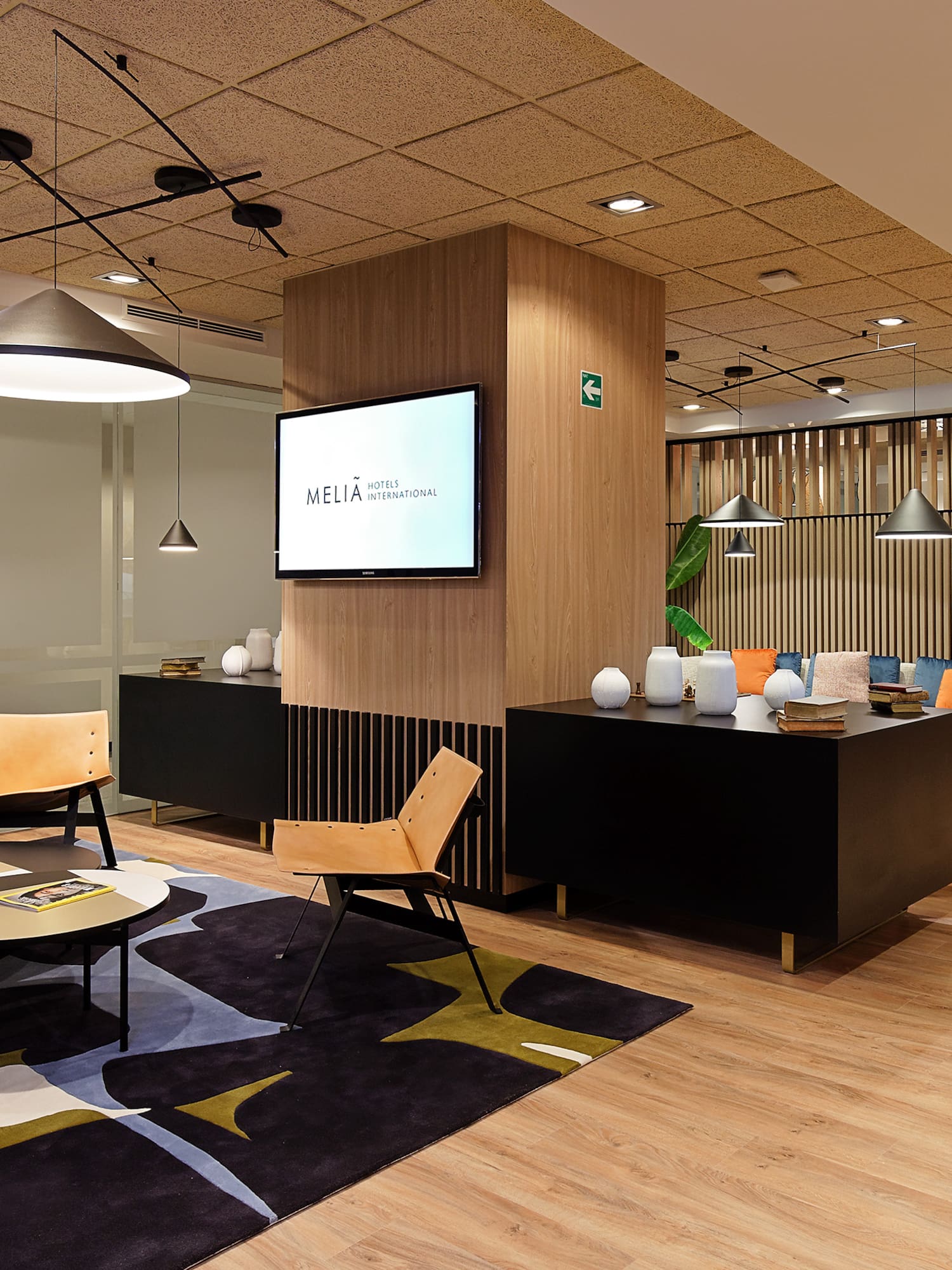 a room with a tv and a table