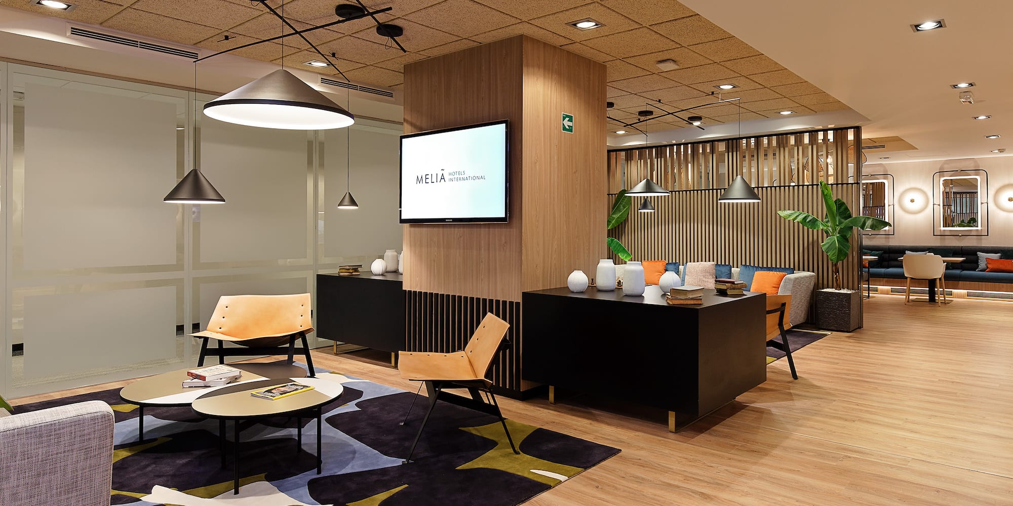 a room with a tv and a table