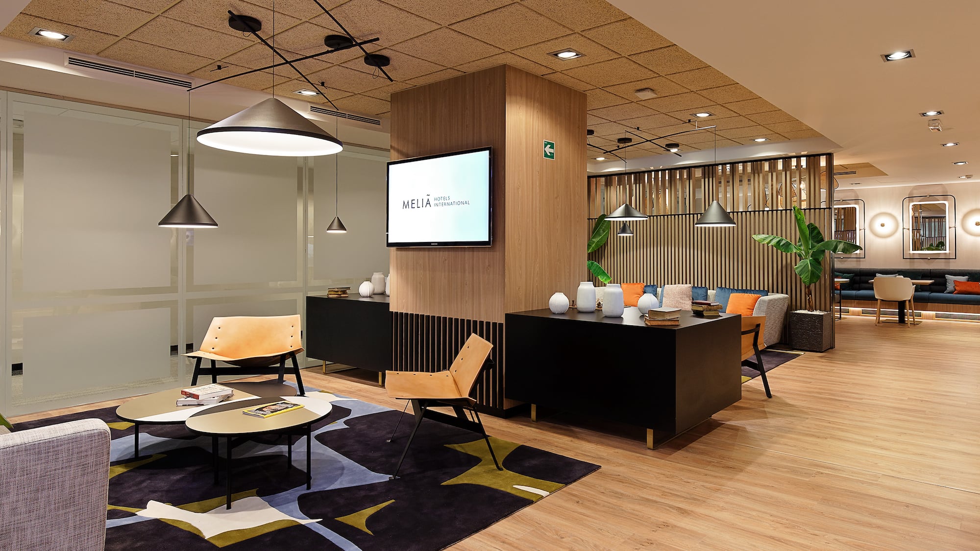 a room with a tv and a table