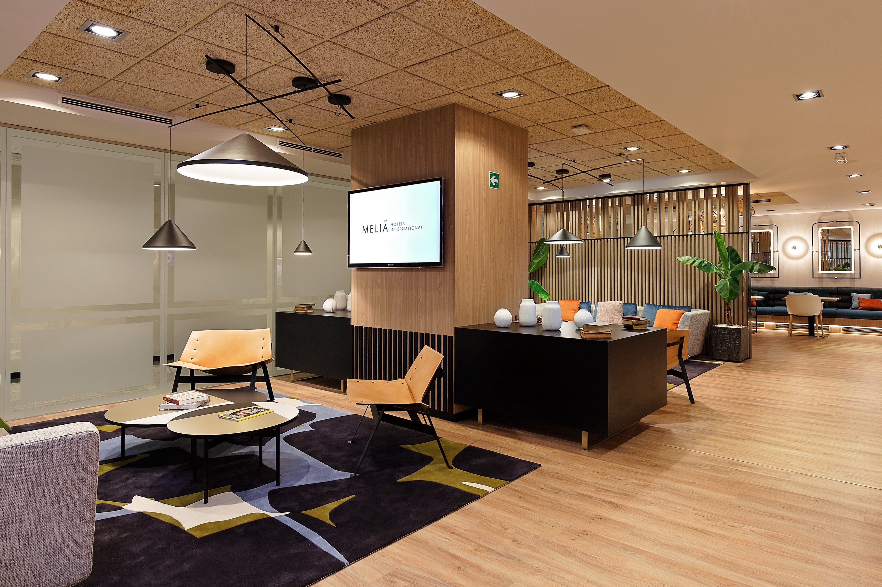 a room with a tv and a table