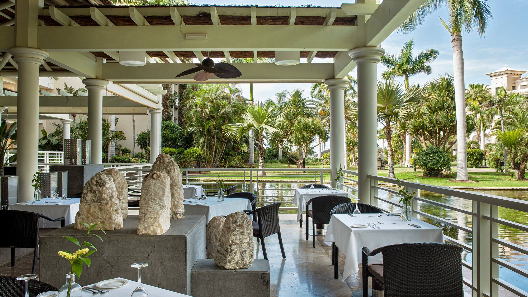 a restaurant with tables and chairs