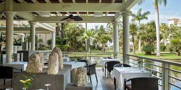 a restaurant with tables and chairs