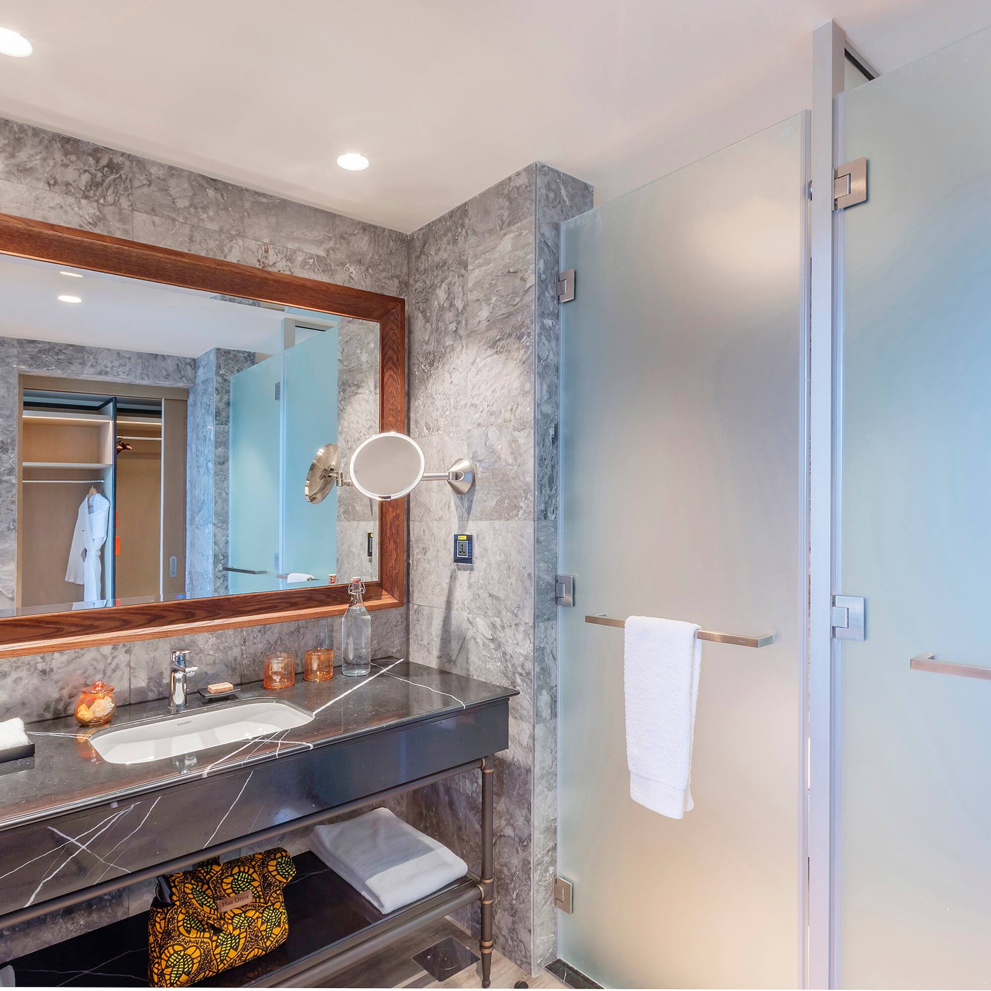 a bathroom with a mirror and sink