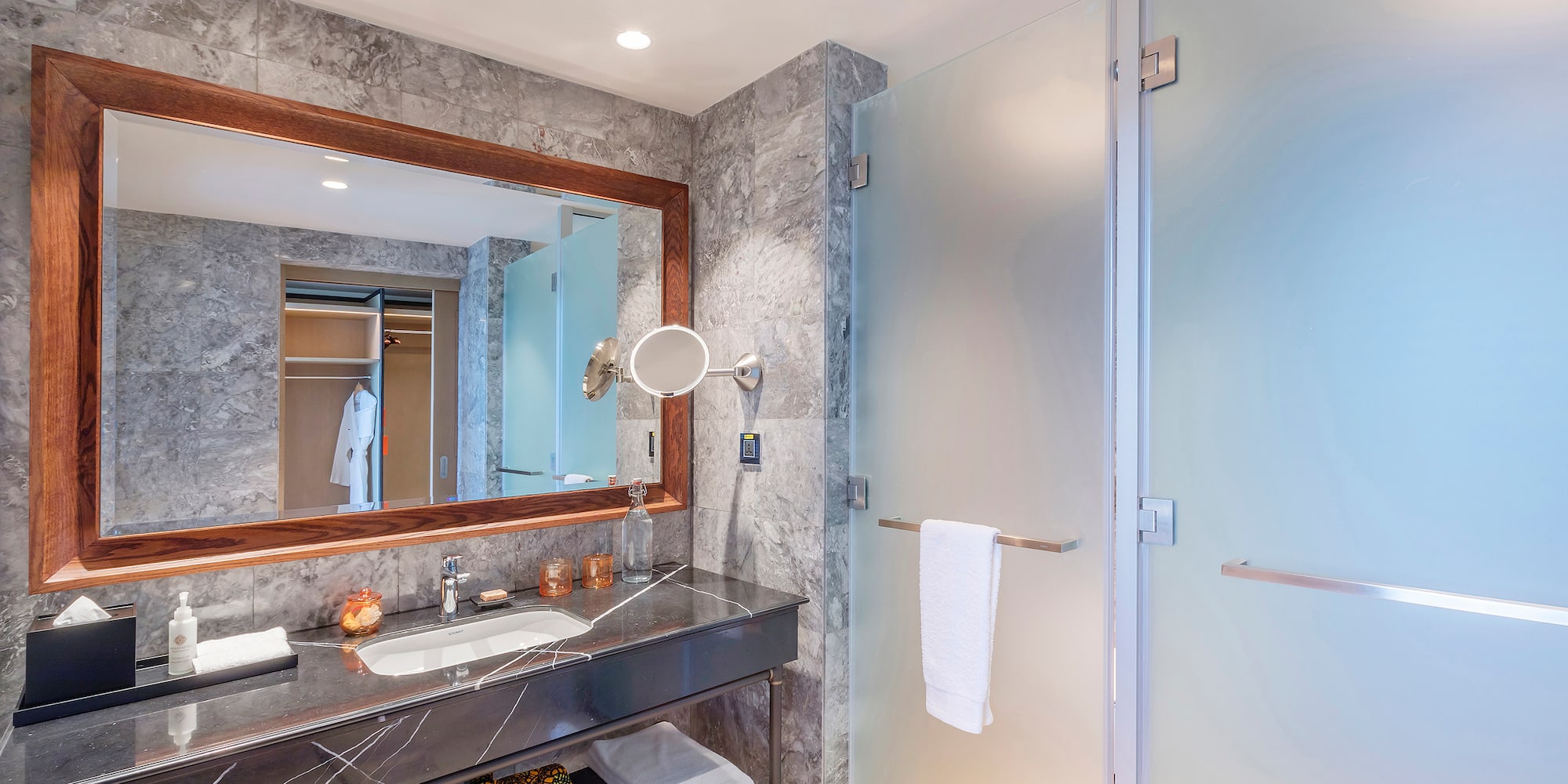 a bathroom with a mirror and sink