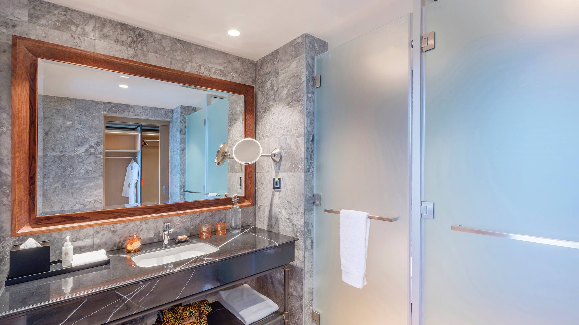 a bathroom with a mirror and sink