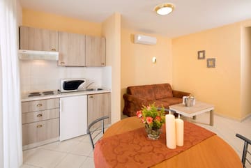 a living room with a couch and a table