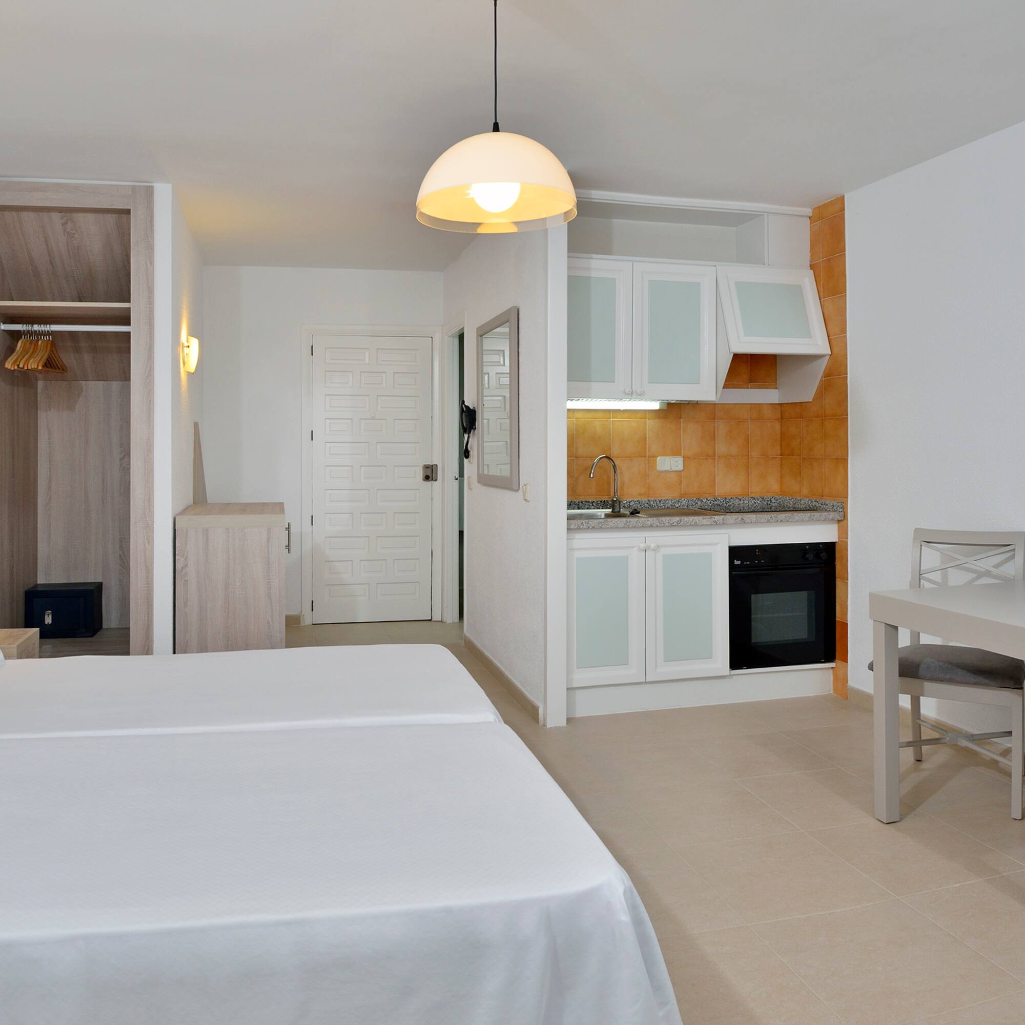 a room with a bed and a table