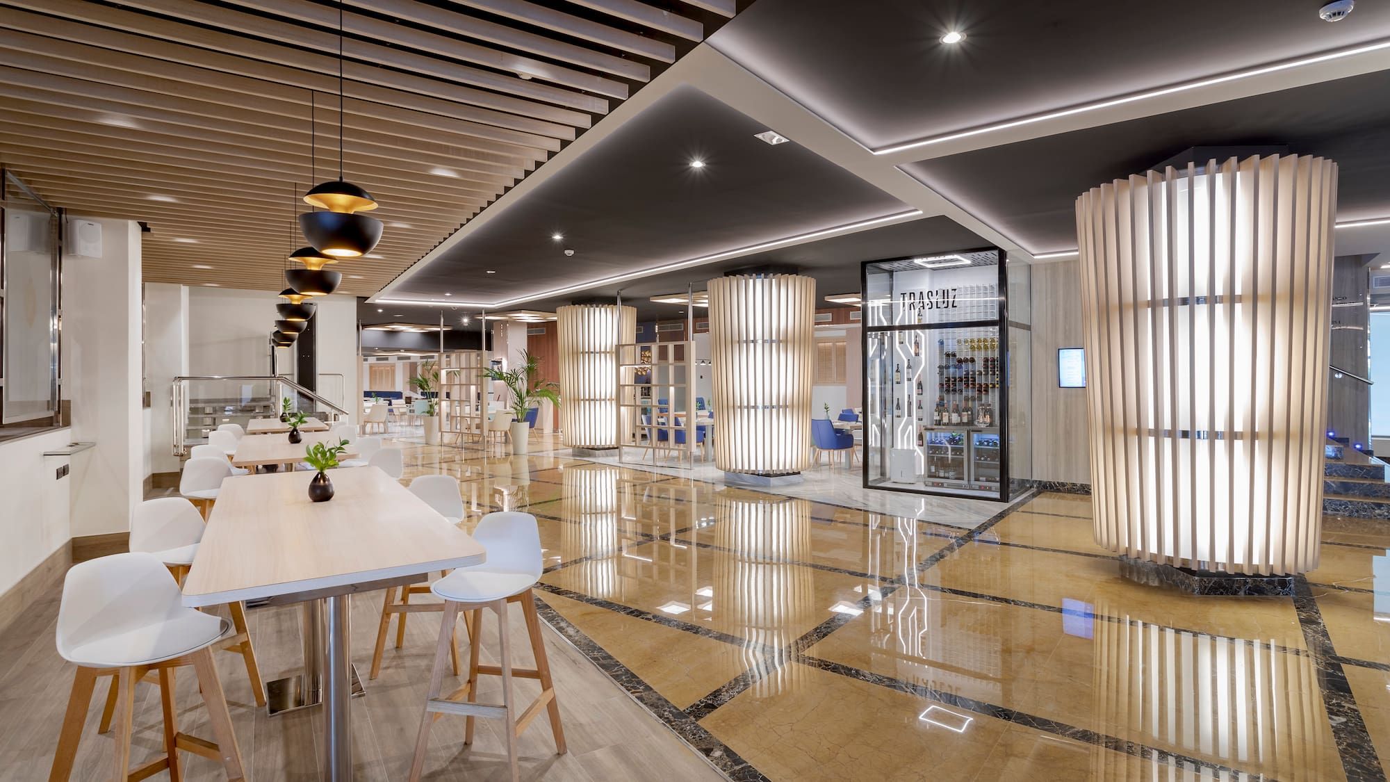 a large room with tables and chairs