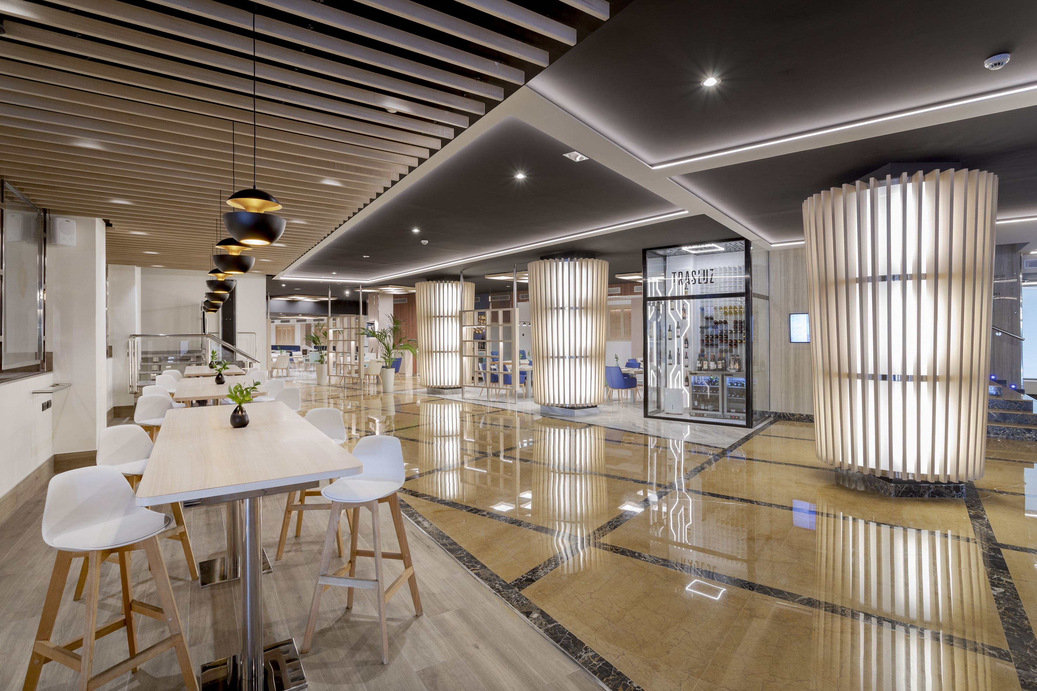 a large room with tables and chairs