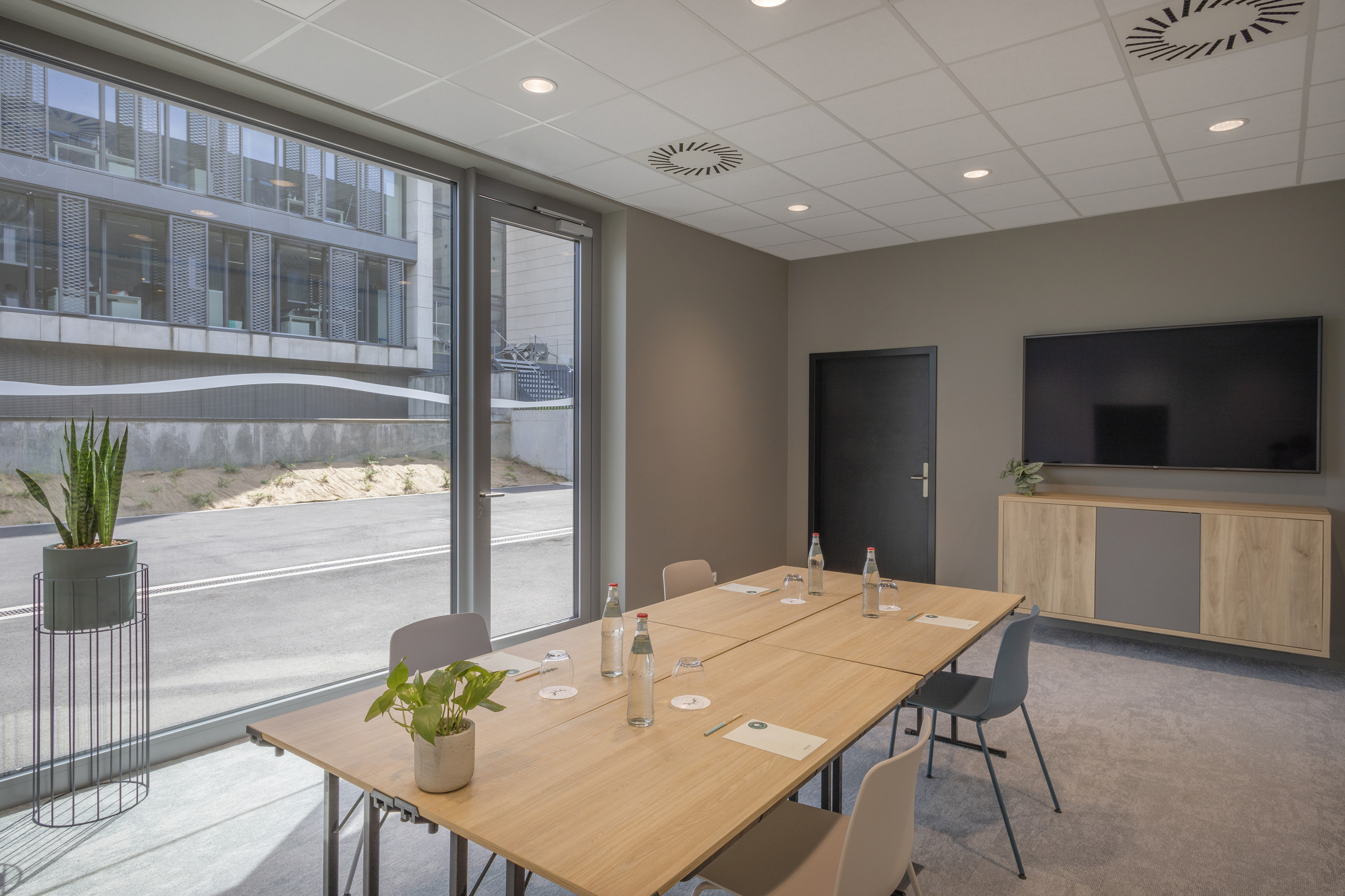 a room with a table and chairs