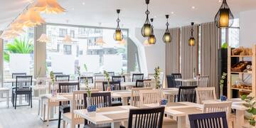 a room with tables and chairs