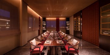 a room with a table and chairs