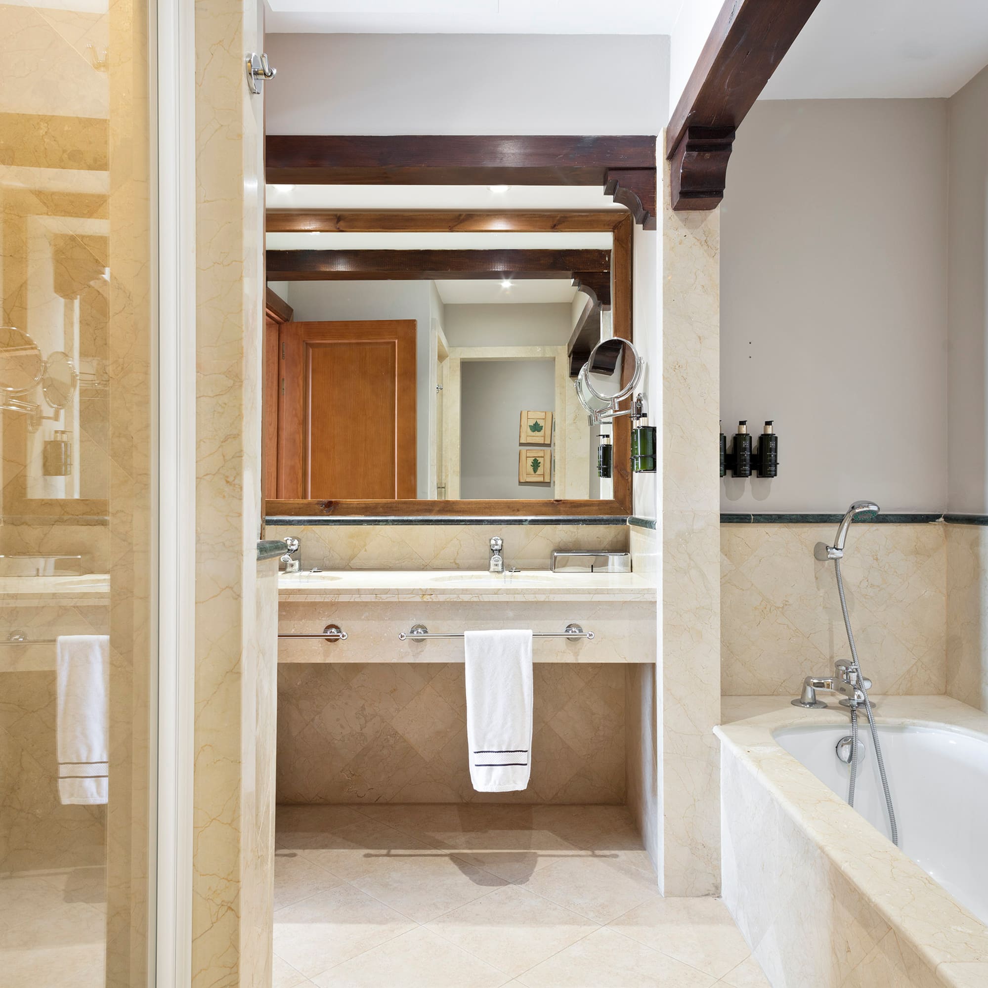 a bathroom with a bathtub and sink