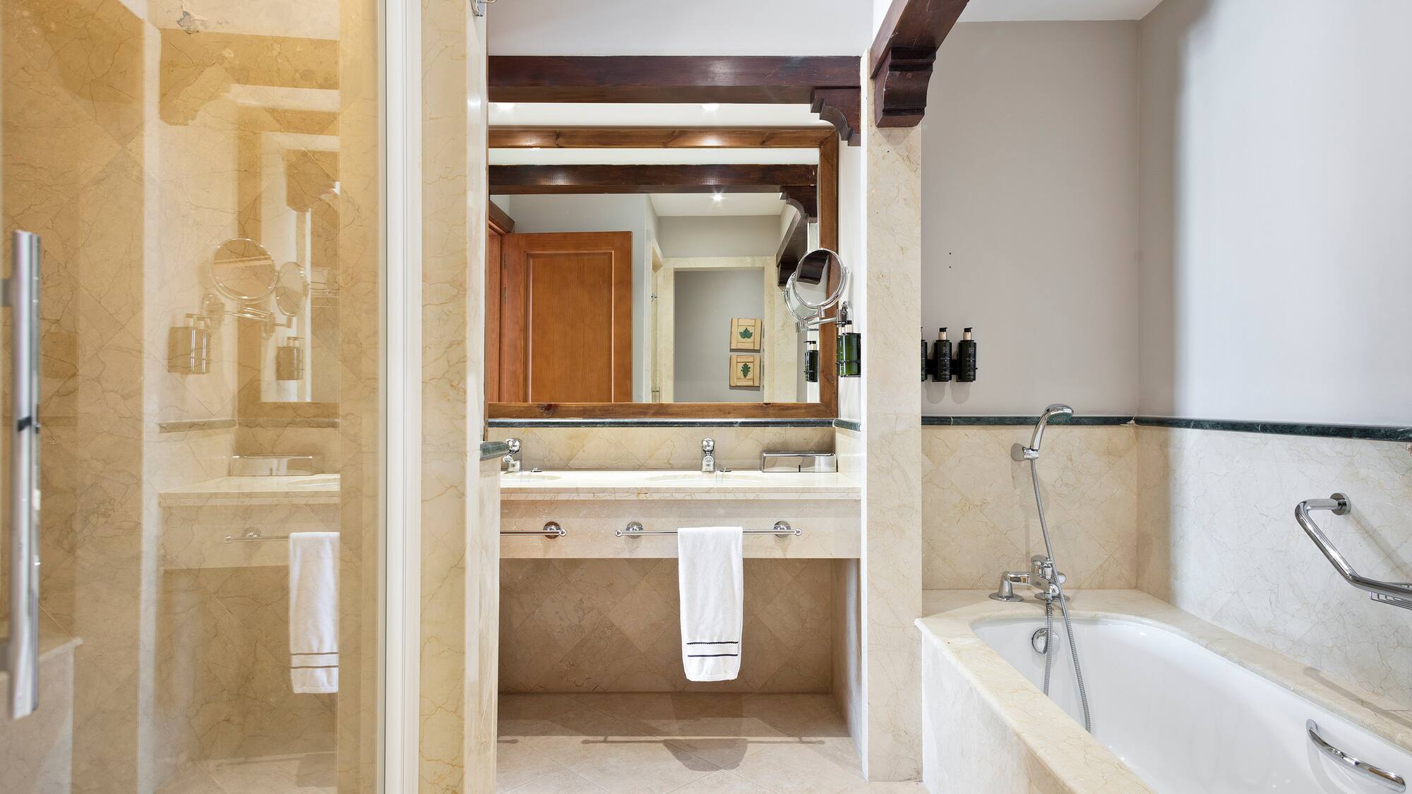 a bathroom with a bathtub and sink