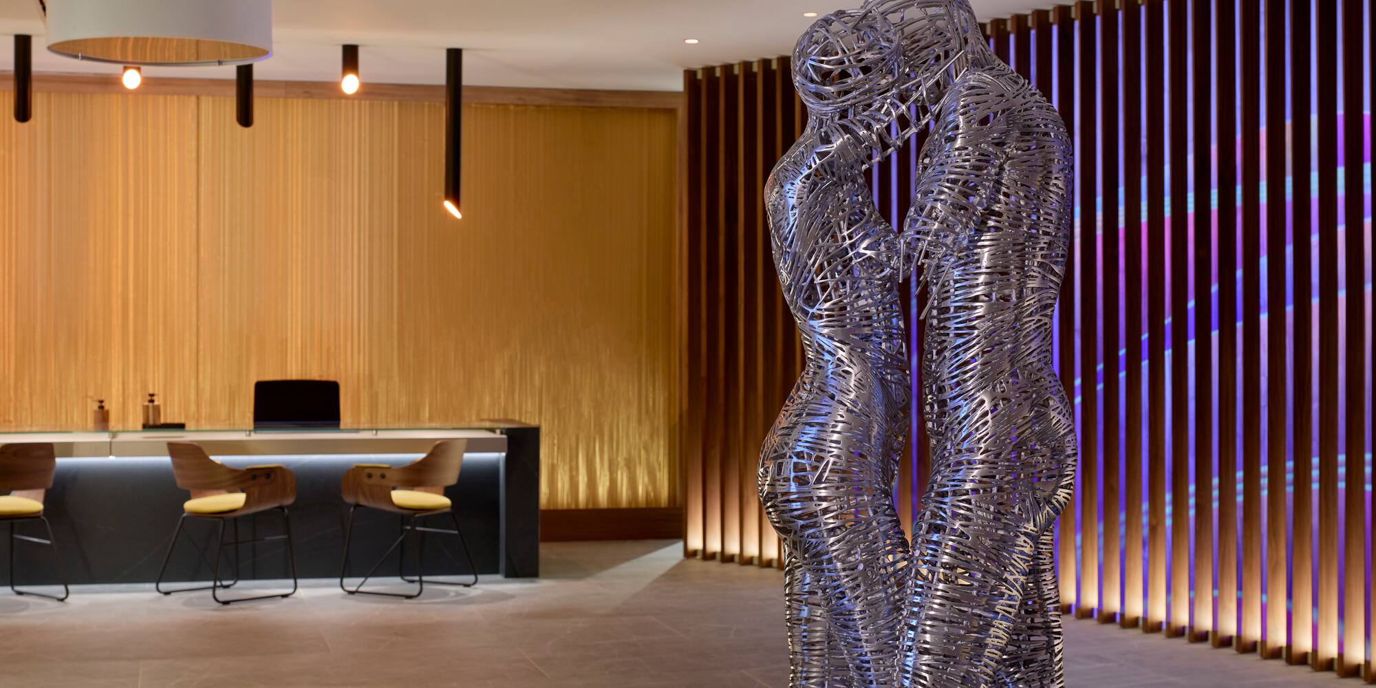 a statue of two people in a room