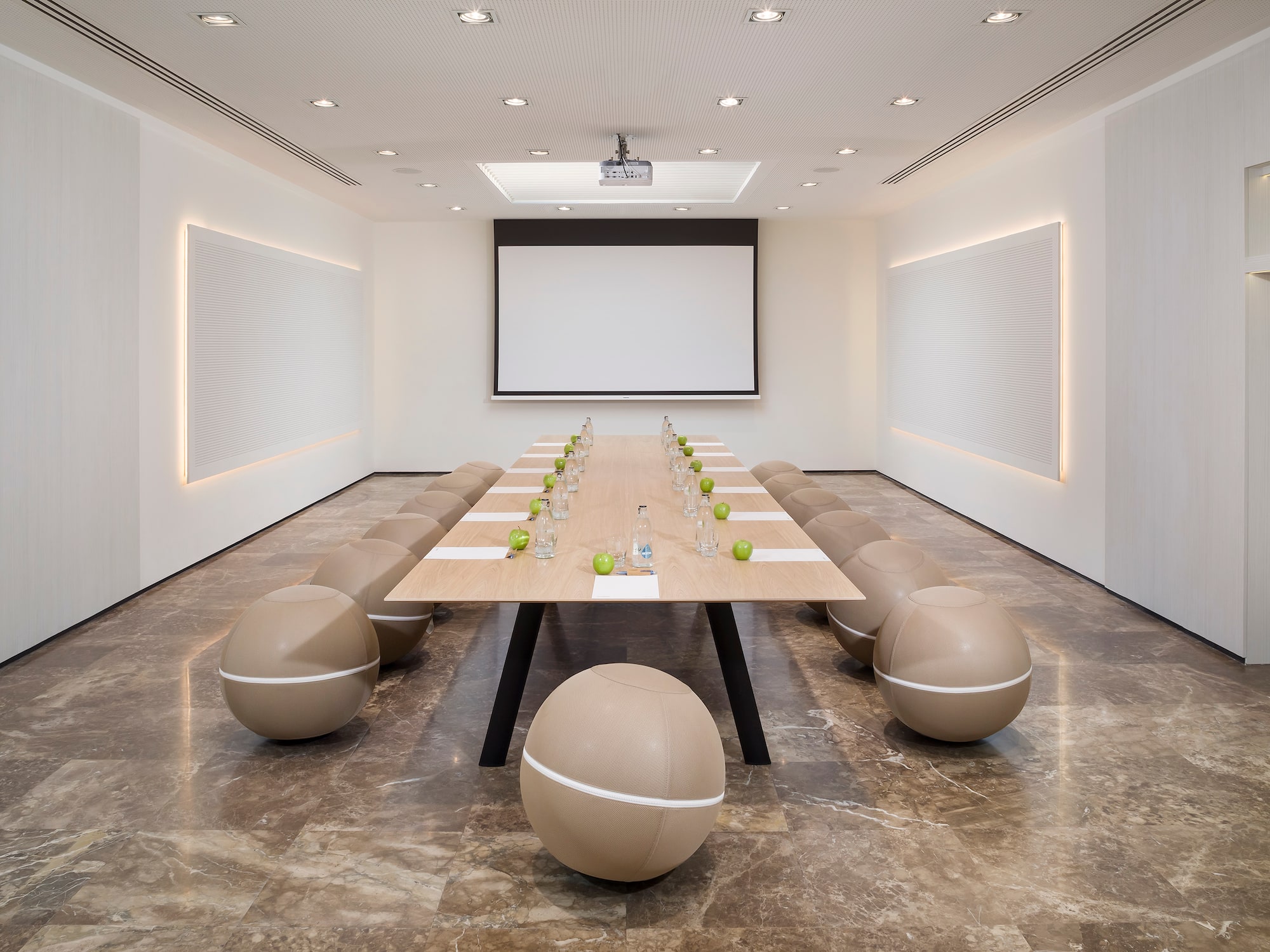 a room with a table and chairs