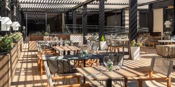a restaurant with tables and chairs
