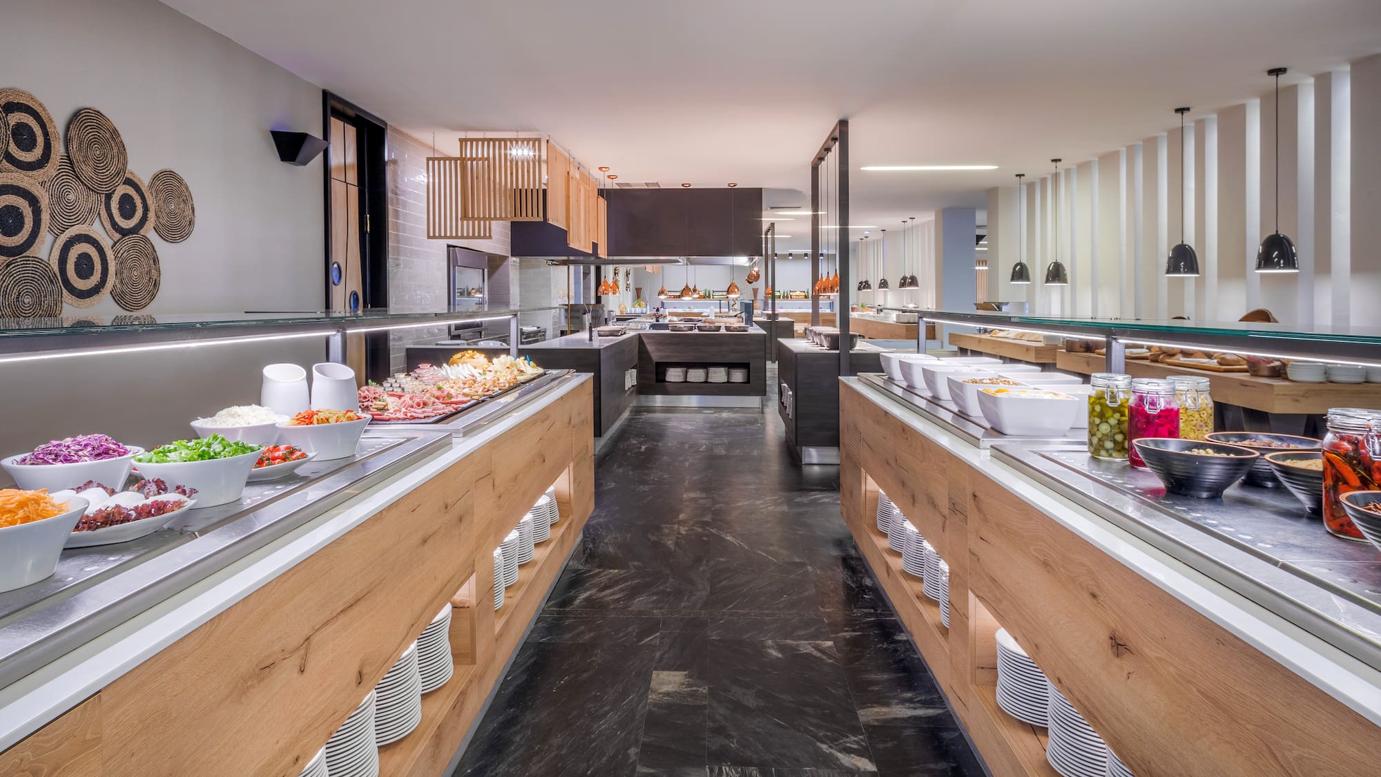 a large kitchen with food on the counter