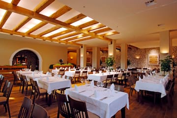 a room with tables and chairs